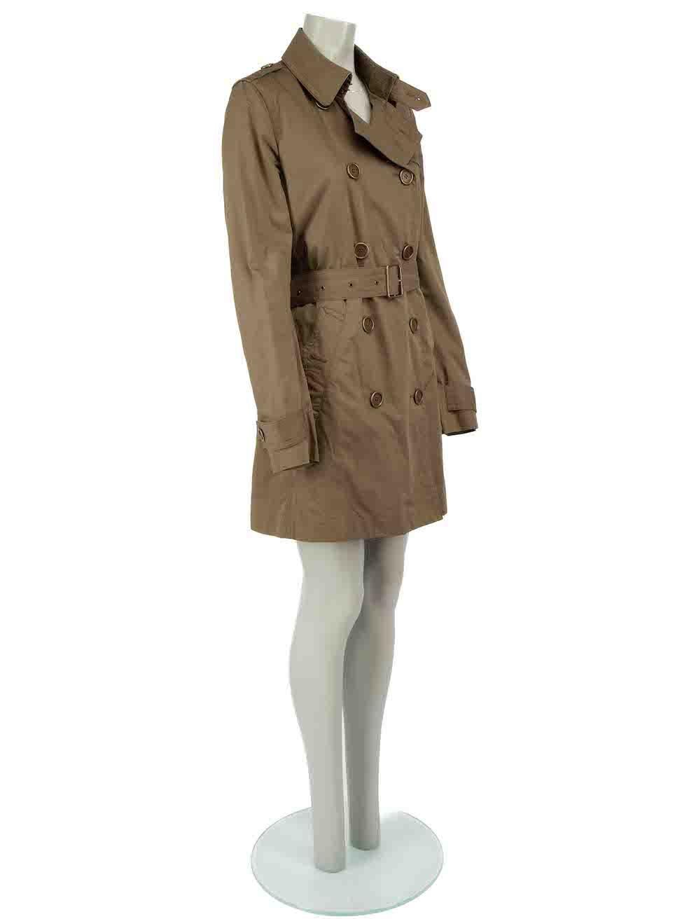CONDITION is Very good. Minimal wear to coat is evident. Minimal wear to the right lapel lining with discoloured marks on this used Burberry Brit designer resale item.
 
 Details
 Green
 Cotton
 Trench coat
 Removable internal layer
 Belted
 Button