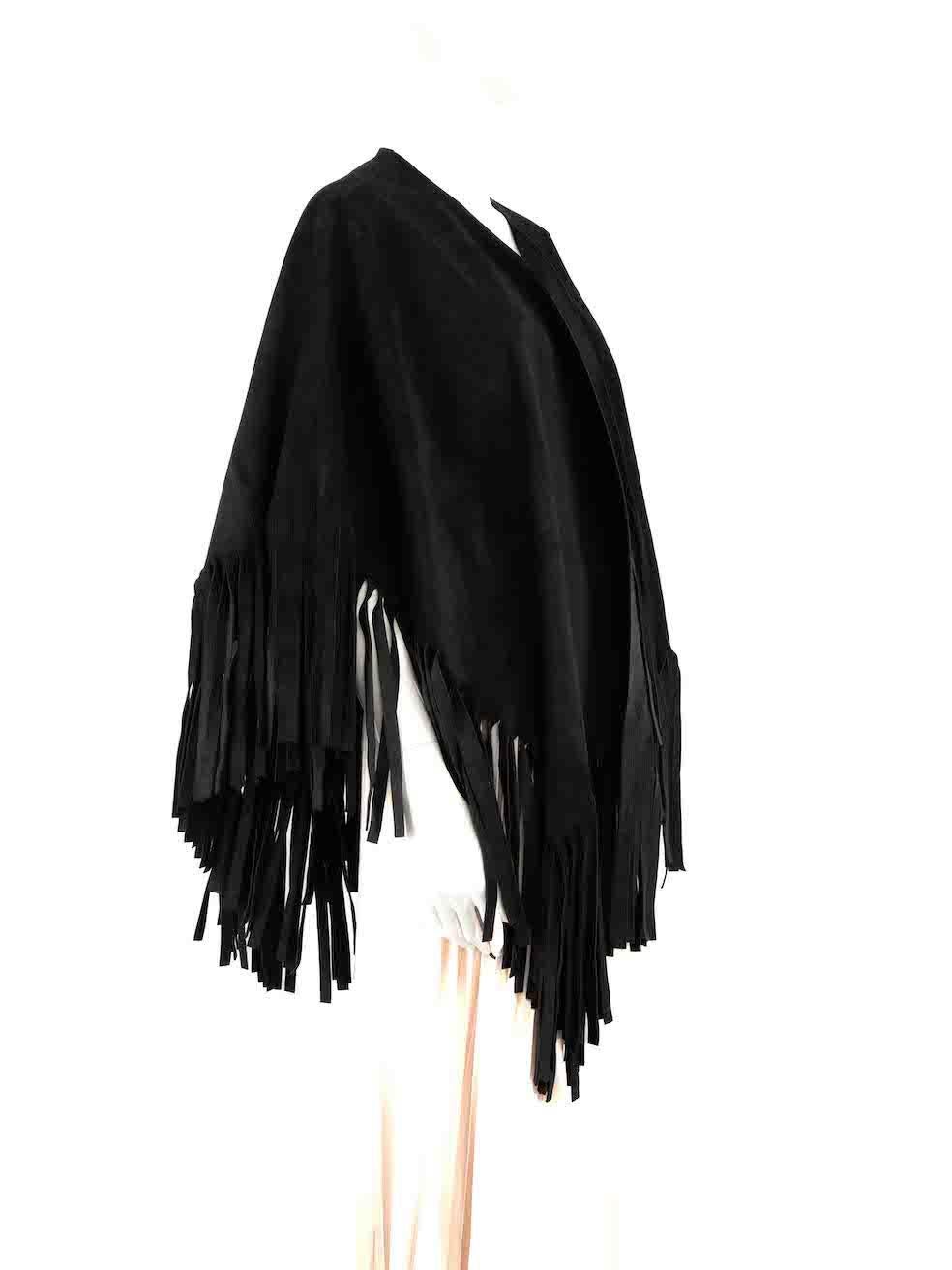 CONDITION is Very good. Minimal wear to cape is evident. Minimal wear to the rear neckline with light marks to the suede on this used Burberry Prorsum designer resale item.
 
 
 
 Details
 
 
 Black
 
 Suede
 
 Poncho
 
 Fringed hem
 
 
 
 
 
 Made