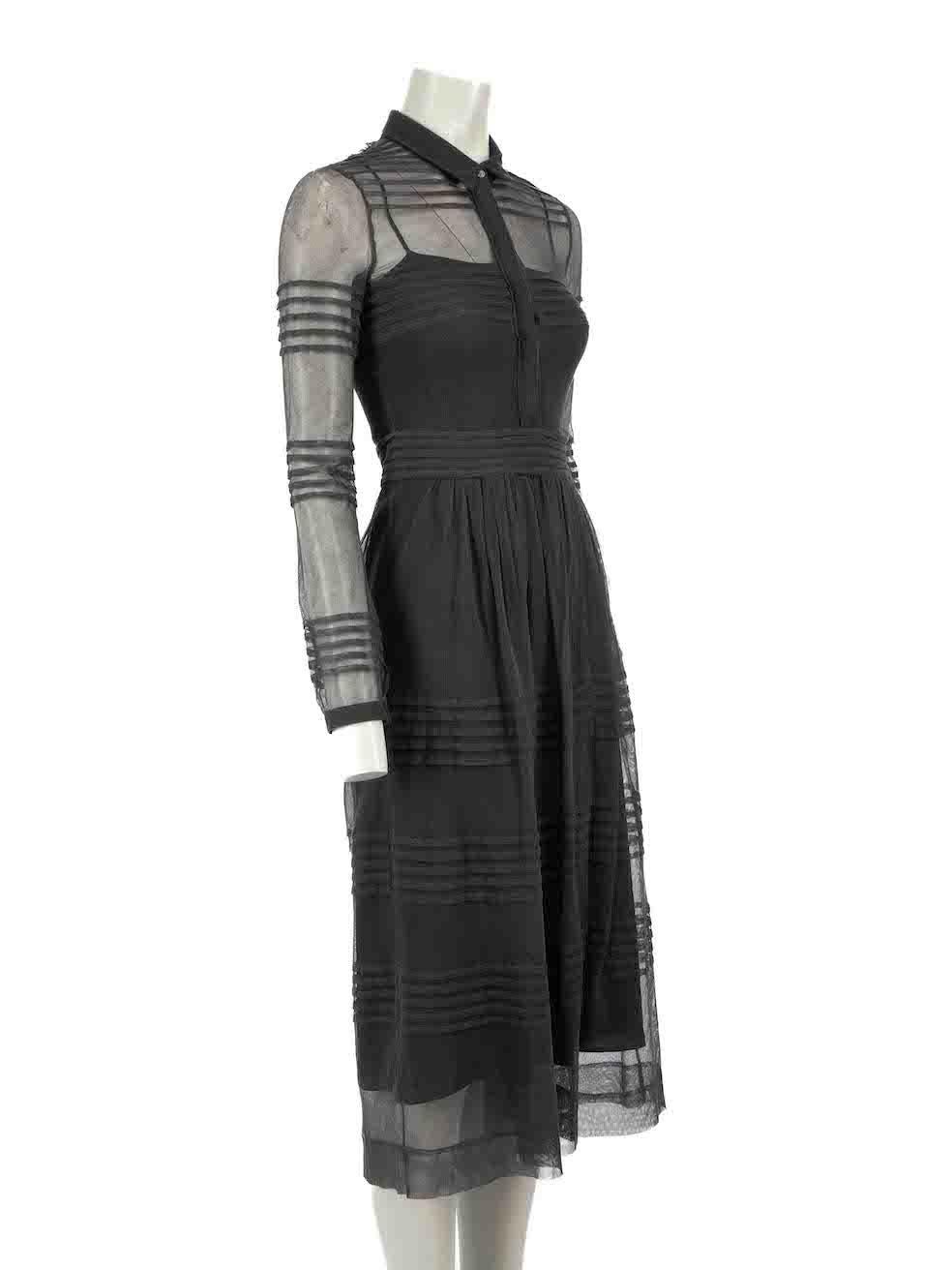 CONDITION is Very good. Hardly any visible wear to dress is evident on this used Burberry designer resale item.
 
Details
Grey
Viscose
Shirt dress
Round neck
Long sleeves
Sheer
Midi
Stripe pleated pattern
Frond button fastening
Side zip