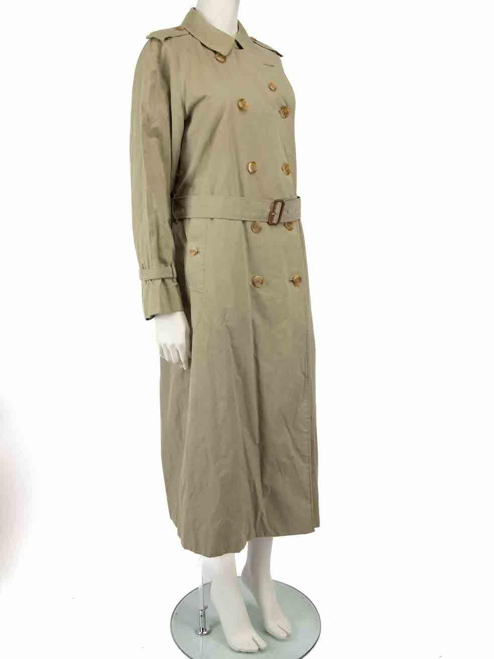 CONDITION is Good. General wear to coat is evident. Moderate signs of wear to the front, back and sleeves with marks across the piece on this used Burberry's designer resale item.
 
 
 
 Details
 
 
 Vintage
 
 Khaki
 
 Cotton
 
 Trench coat
 
 Long
