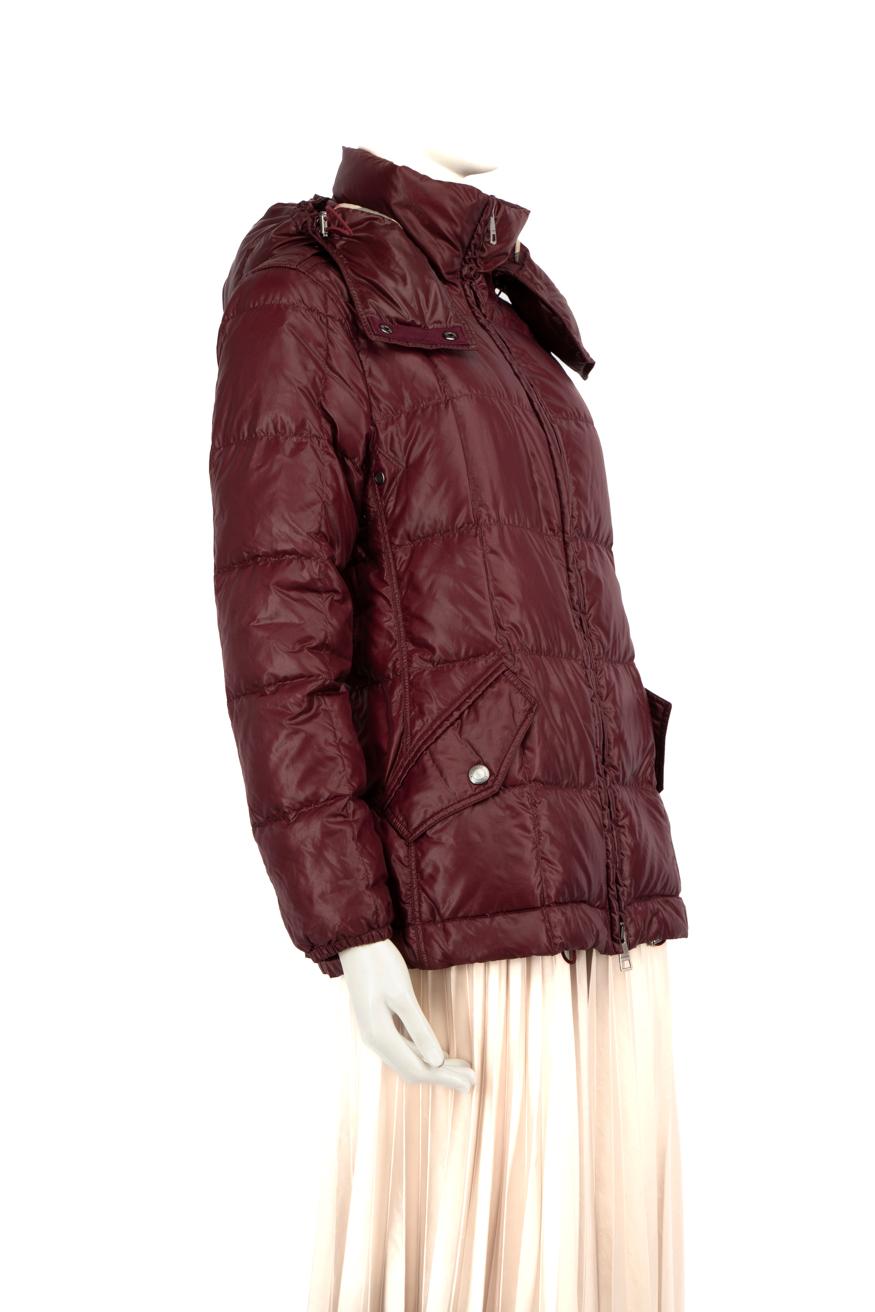 CONDITION is Very good. Minimal wear to the coat is evident, the opening zip is tarnished and some of feathers are coming through the coat on the inside of the hood and the cuffs on this used Burberry designer resale item. Please note the waist belt