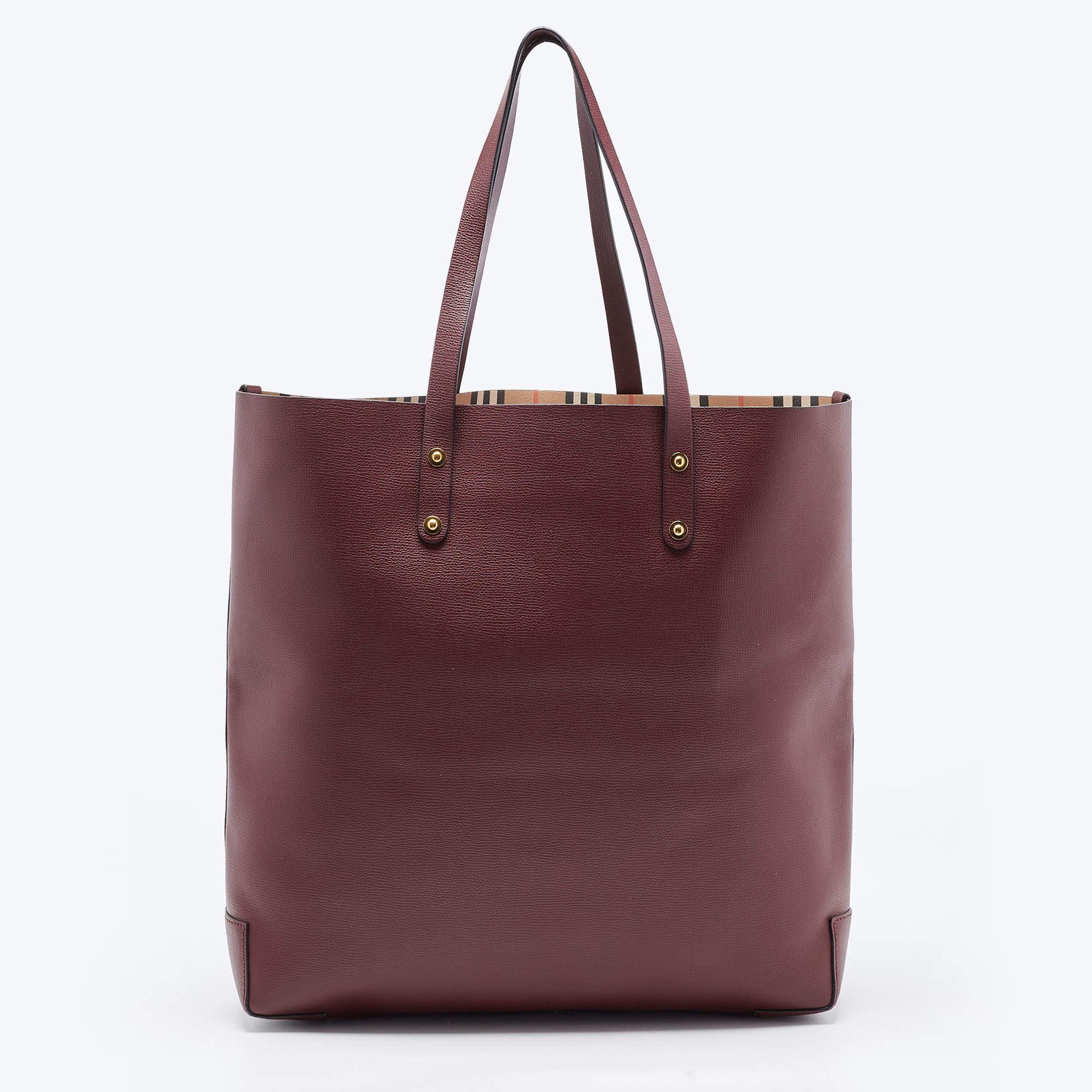 Created from high-quality materials, this tote is enriched with functional and classic elements. It can be carried around conveniently, and its interior is perfectly sized to keep your belongings with ease.

Includes: Info Booklet