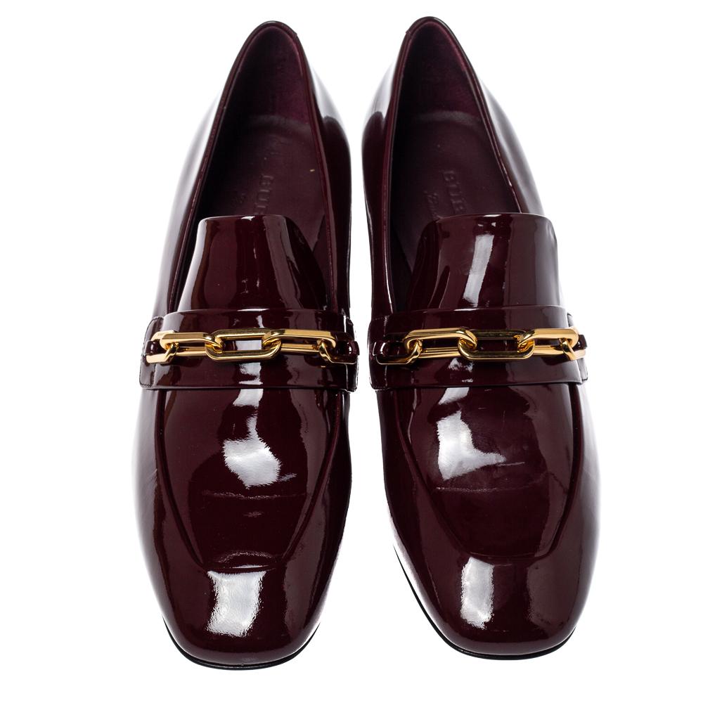 Burberry’s burgundy loafers nod to styles of the 1960s and 1970s – note the gold-tone metal chain-link strap. Crafted in Italy from smooth patent leather, they’re cut to a almond-shaped toe, then set on a block heel. Team them with neutral separates