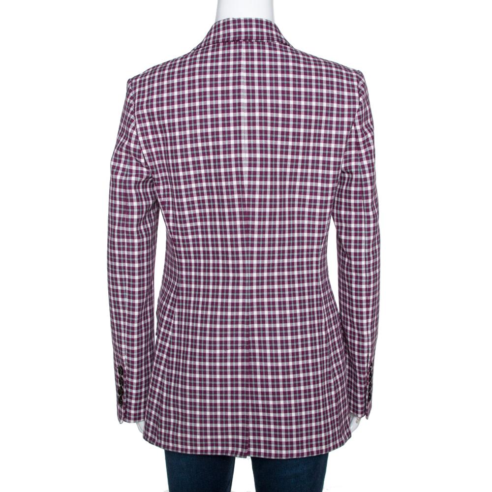 This Burberry blazer is designed to lift your wardrobe. The blazer features a front button closure, long sleeves and plaid check all over. Tailored to fit you perfectly, this piece will offer a quintessential urban look.

Includes:Price Tag