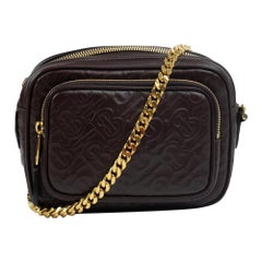 Burberry, Camera in burgundy leather