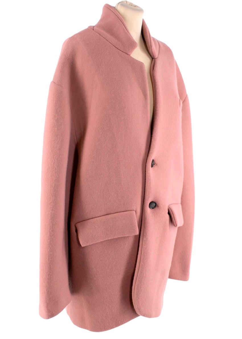 Burberry Cashmere Blend Blush Pink Single Breasted Coat
 

 - Single breasted car coat in warm blush pink cashmere blend
 - Long sleeves, cuffs finished with a black button closure
 - 2 flap pockets at the front and one welt pocket
 - Two black-tone