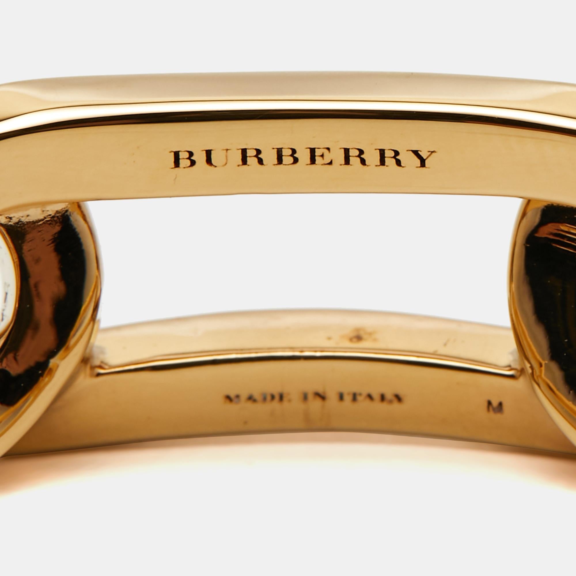 This beautiful Burberry chain link cuff bracelet is sure to stand out when it sits on your wrist. Crafted with precision, the fine bracelet will be an investment you'll love.

Includes: Brand Tag