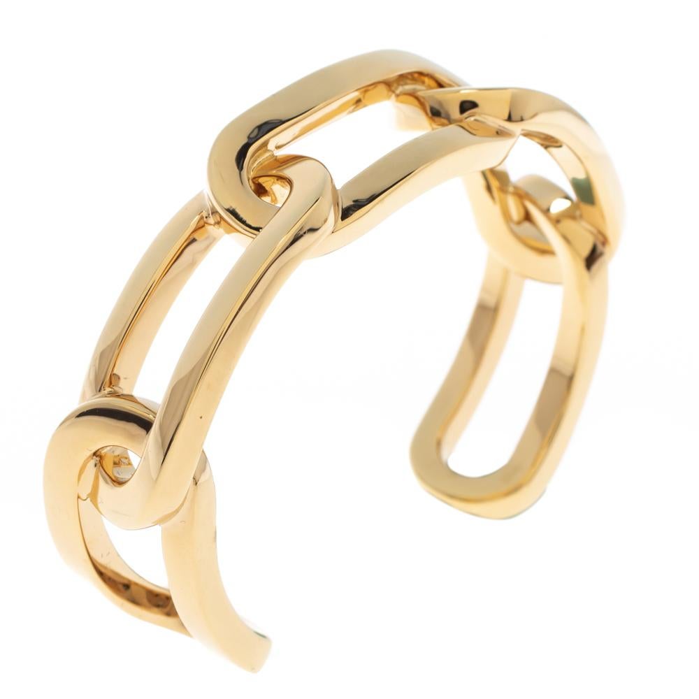 For the woman who is ready to ace every accessory game, Burberry brings her this fabulous open cuff bracelet made from gold-tone metal into a chainlink silhouette. The bracelet has a simple style with smooth edges and hallmark engravings.

Includes: