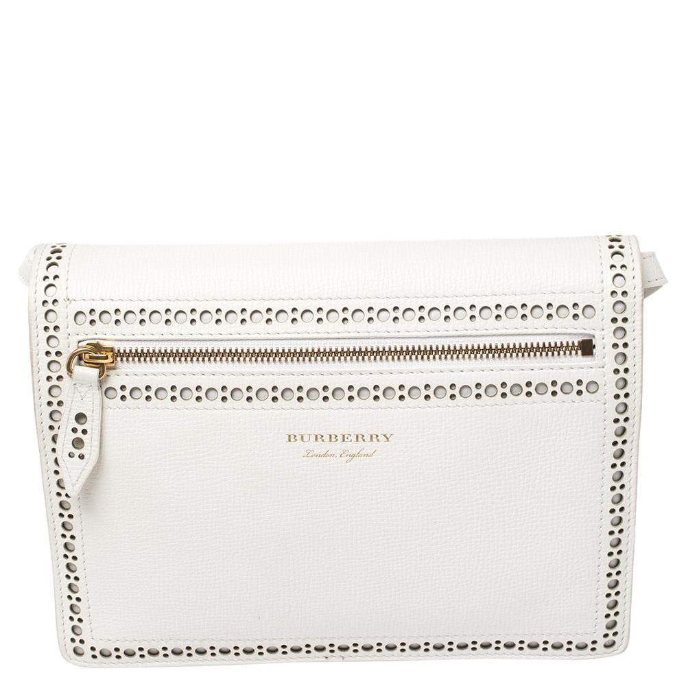 Showcasing a timeless design and durable construction, this Macken shoulder bag from Burberry offers style and practical ease. It's a well-made piece crafted using white leather and detailed with brogue accents, fringes, and tassels. Complete with a