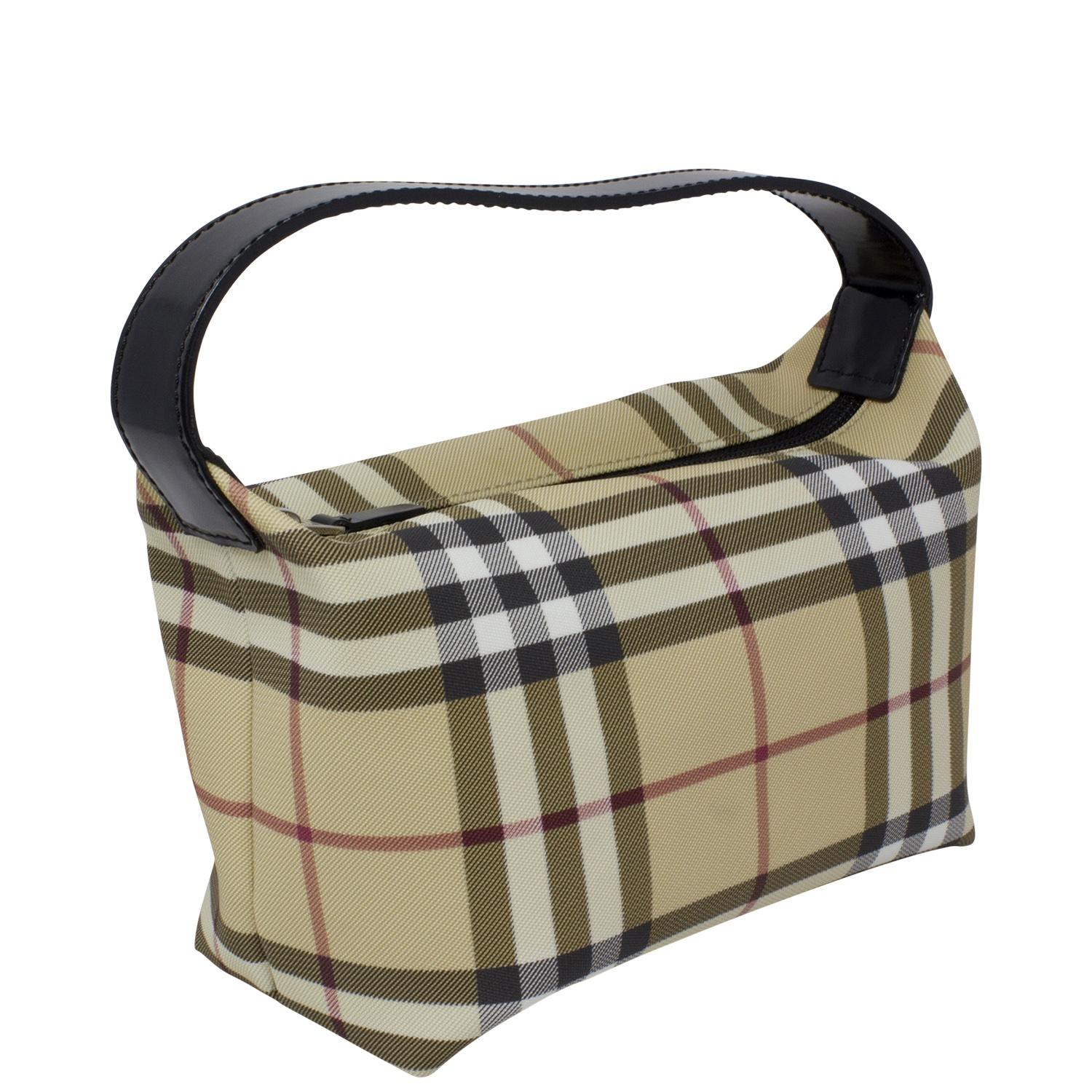 Burberry plaid is back ladies and gents! We love this classic cutie piece with such a perfect petite silhouette. Perfect for summer but works year round. Rendered in the classic Burberry check plaid print in coated canvas, black patent leather flat