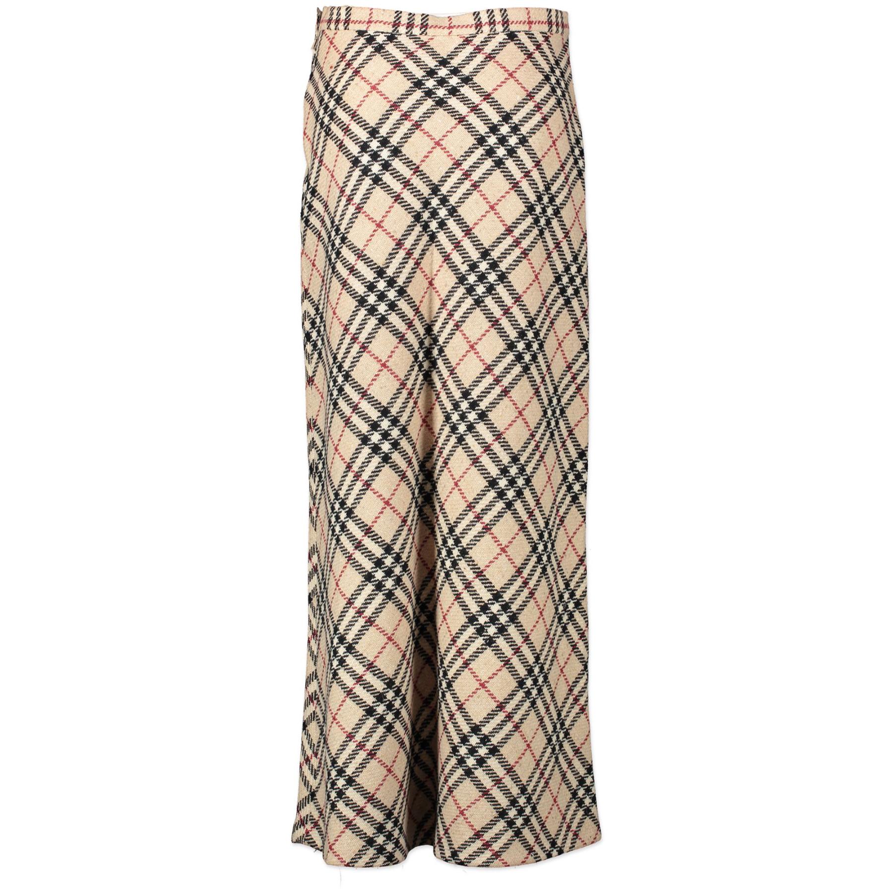 Procurez-vous cette jupe longue et élégante de Burberry. Il est confectionné en 100% laine et présente un motif écossais. Sortez avec style avec cette jupe intemporelle !
