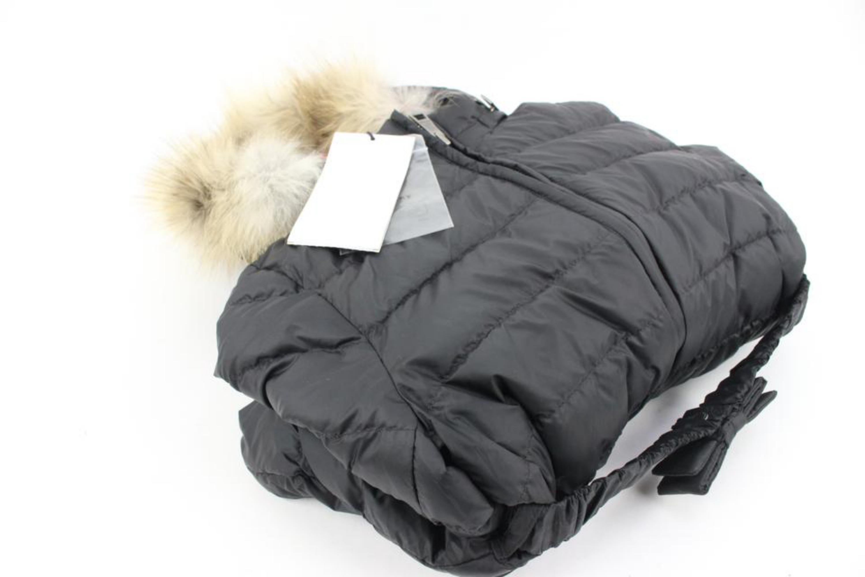 Burberry Children Kid's 7Y Black Puffer Fur Trimmed Coat Winter Jacket 124b16
Date Code/Serial Number: CNGUATRI8PAN
Made In: China
Measurements: Length:  14