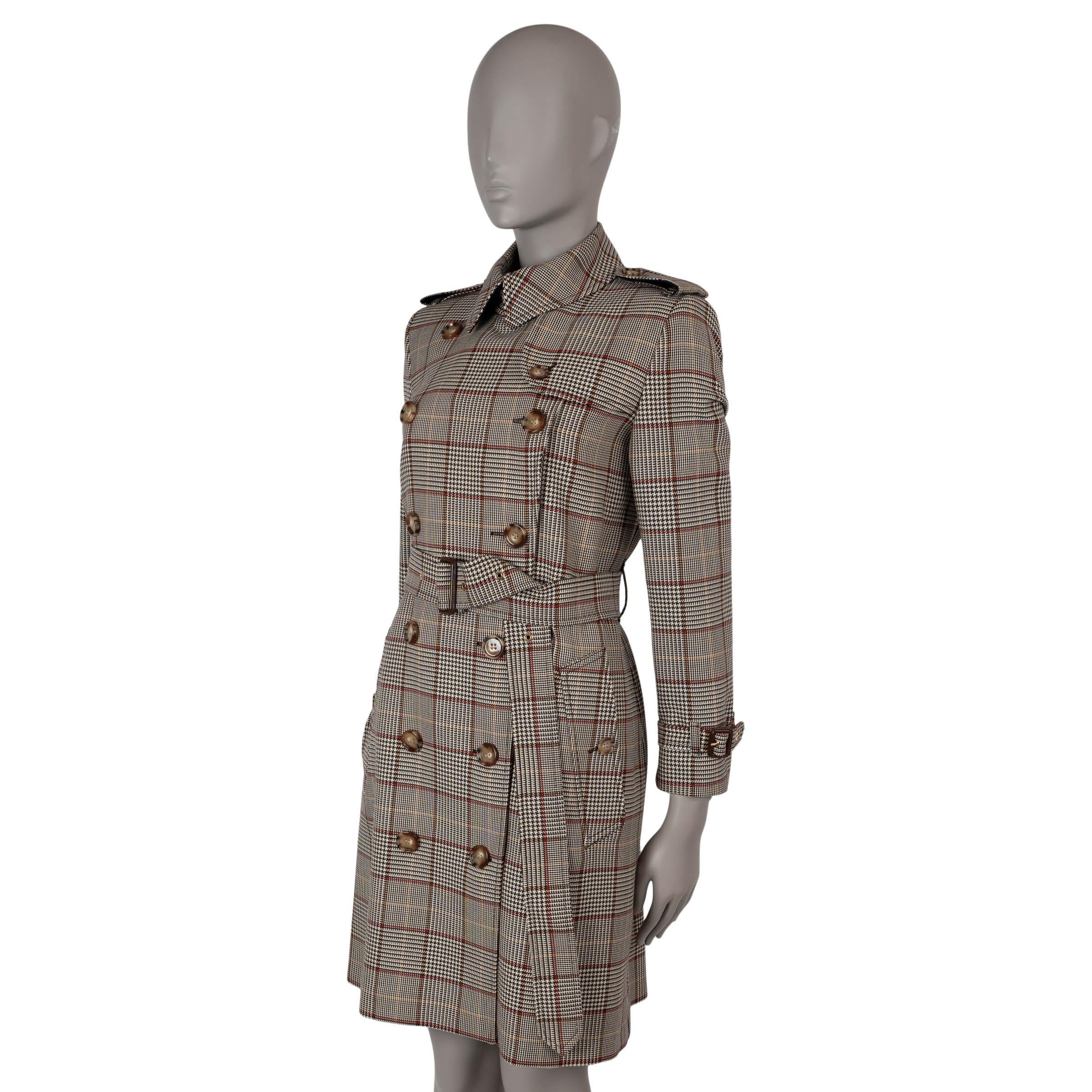 This 100% authentic Burberry Kensington trench coat is crafted from Clove brown, beige, red, and yellow Prince of Wales check wool (100%). It features a classic silhouette with iconic details such as epaulettes, belted cuffs, a storm flap, and a