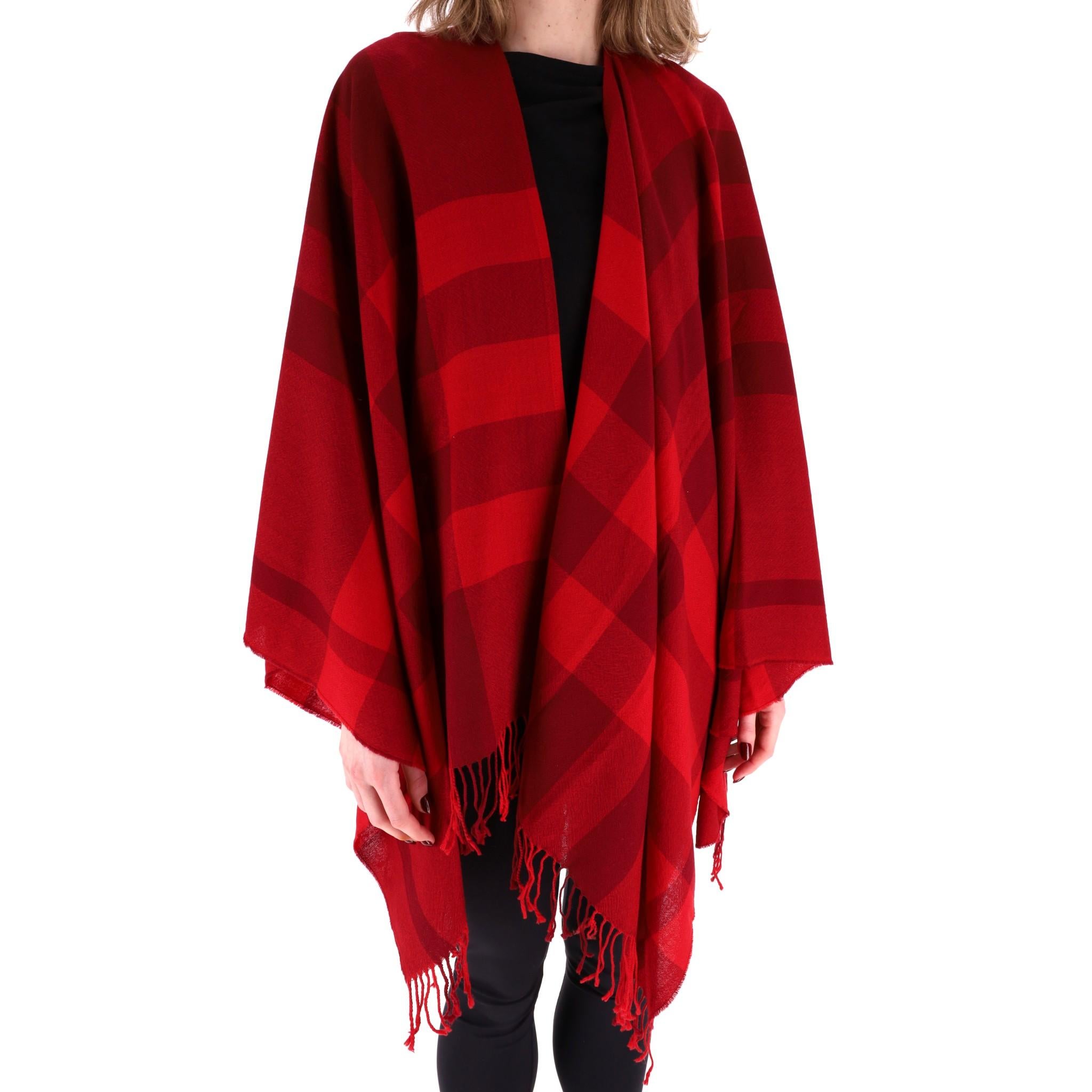 Burberry Colette Checked Merino Wool Shape

Red cape crafted fully crafted from merino wool in oversized Burberry iconic check pattern.

Detailed with twisted fringed edges. Rrp Approx. £1,030

Size – 140 x 135 cm

Condition – Very Good

Composition