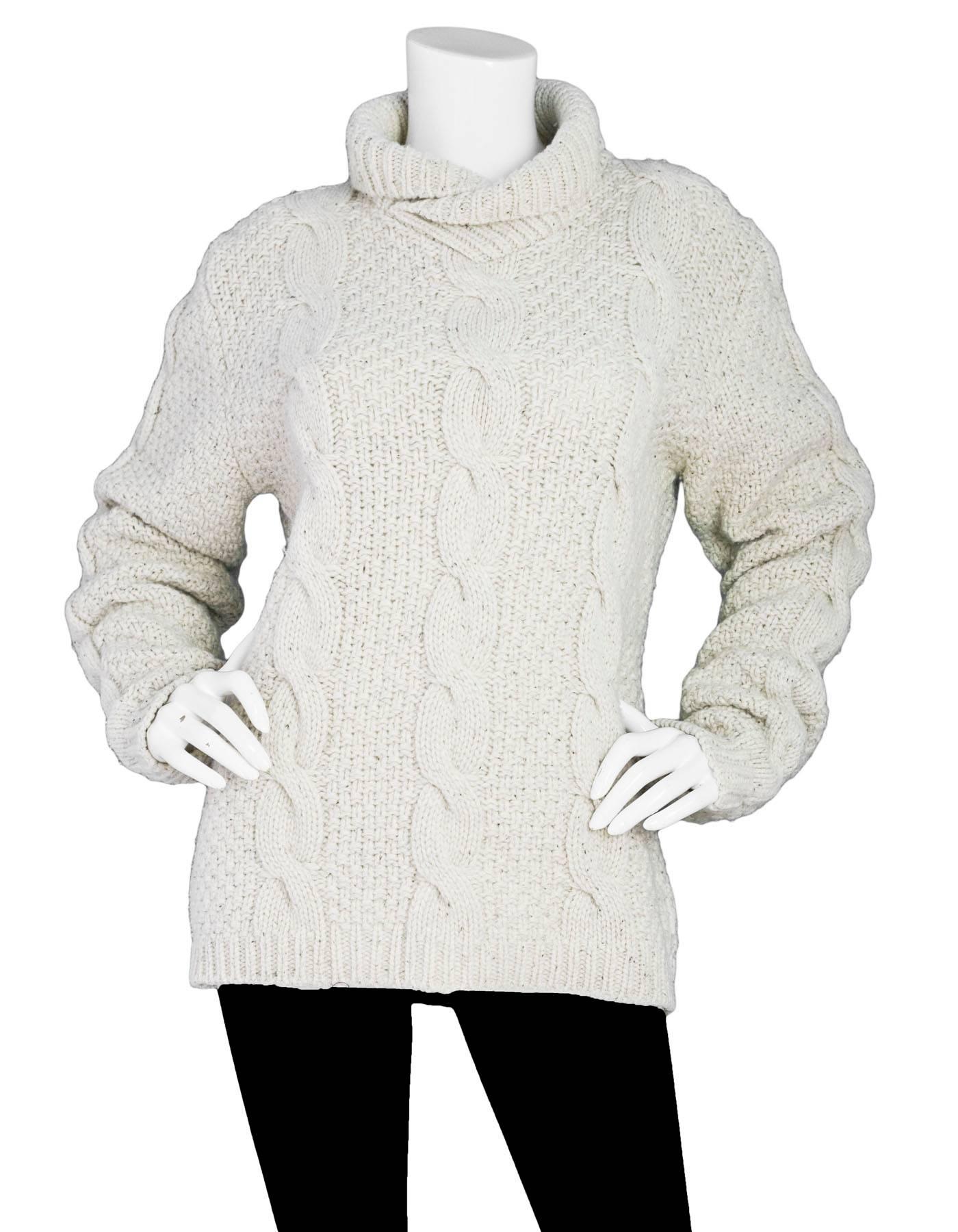 Burberry Cream Wool Cable-Knit Sweater Sz M

Made In: Italy
Color: Cream
Composition: 100% wool
Lining: None
Closure/Opening: Pull over
Overall Condition: Excellent pre-owned condition, light pilling
Marked Size: M
Bust: 40
