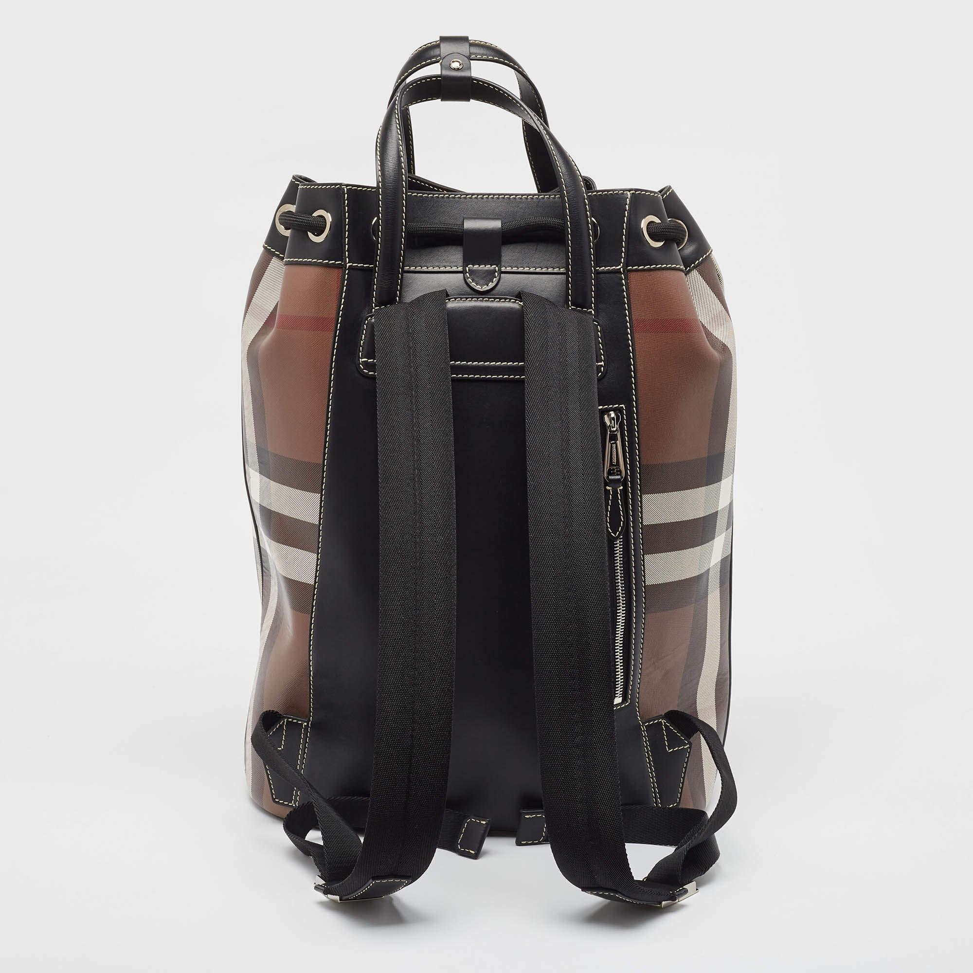 Elevate your style with this Burberry backpack. Crafted with precision and passion, this chic accessory seamlessly blends fashion and function, offering an elegant solution for the modern, on-the-go lifestyle.

Includes: Original Dustbag, Info