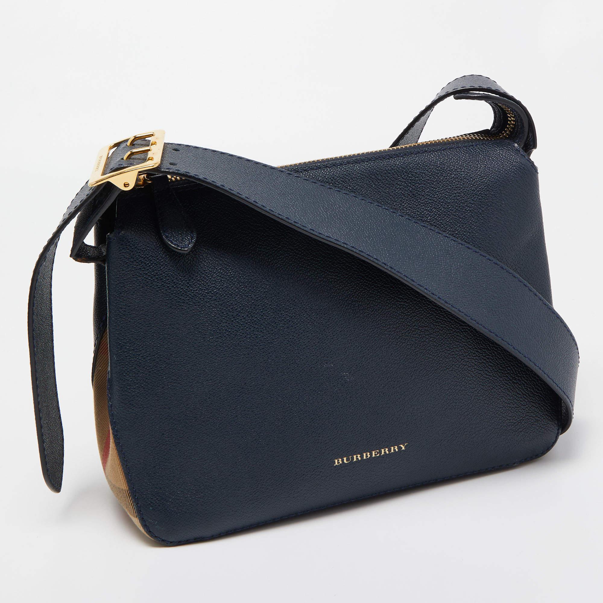 Designed to be durable, this lovely crossbody bag is a prized buy. Chic and easy to carry, the creation comes with a long shoulder strap and a spacious interior to keep your essentials safe.

