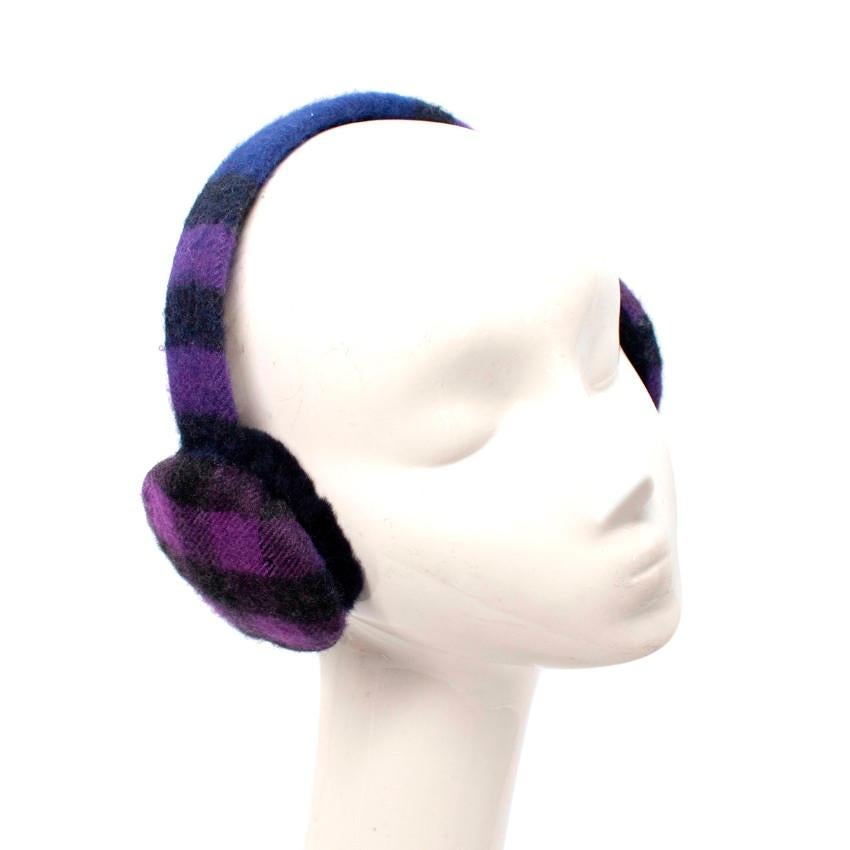Burberry Dark Purple & Black Check Cashmere Earmuffs
 

 - Dark purple & black itineration of the signature check, rendered in a luxurious cashmere weave
 - Fluffy navy wool ear pads
 

 Materials:
 100% Cashmere
 Trimming - 100% Wool
 

 Made in