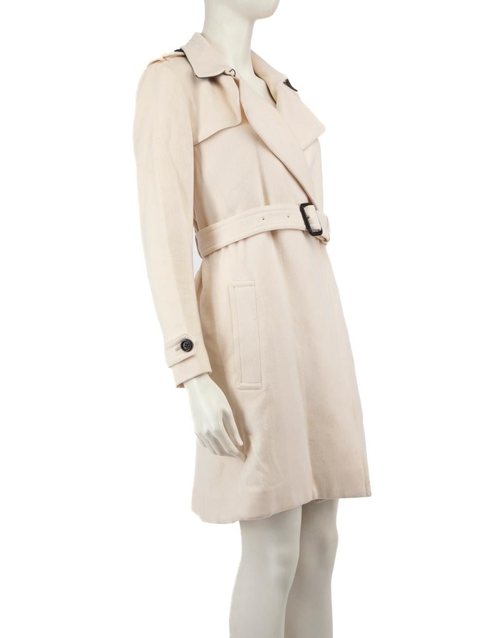CONDITION is Very good. Minimal wear to jacket is evident. Light stains on the collar on he right side and on the storm flap at the back on on this used Burberry designer resale item.
 
 Details
 Ecru
 Cashmere
 Trench coat
 Belt fastening
 Neck