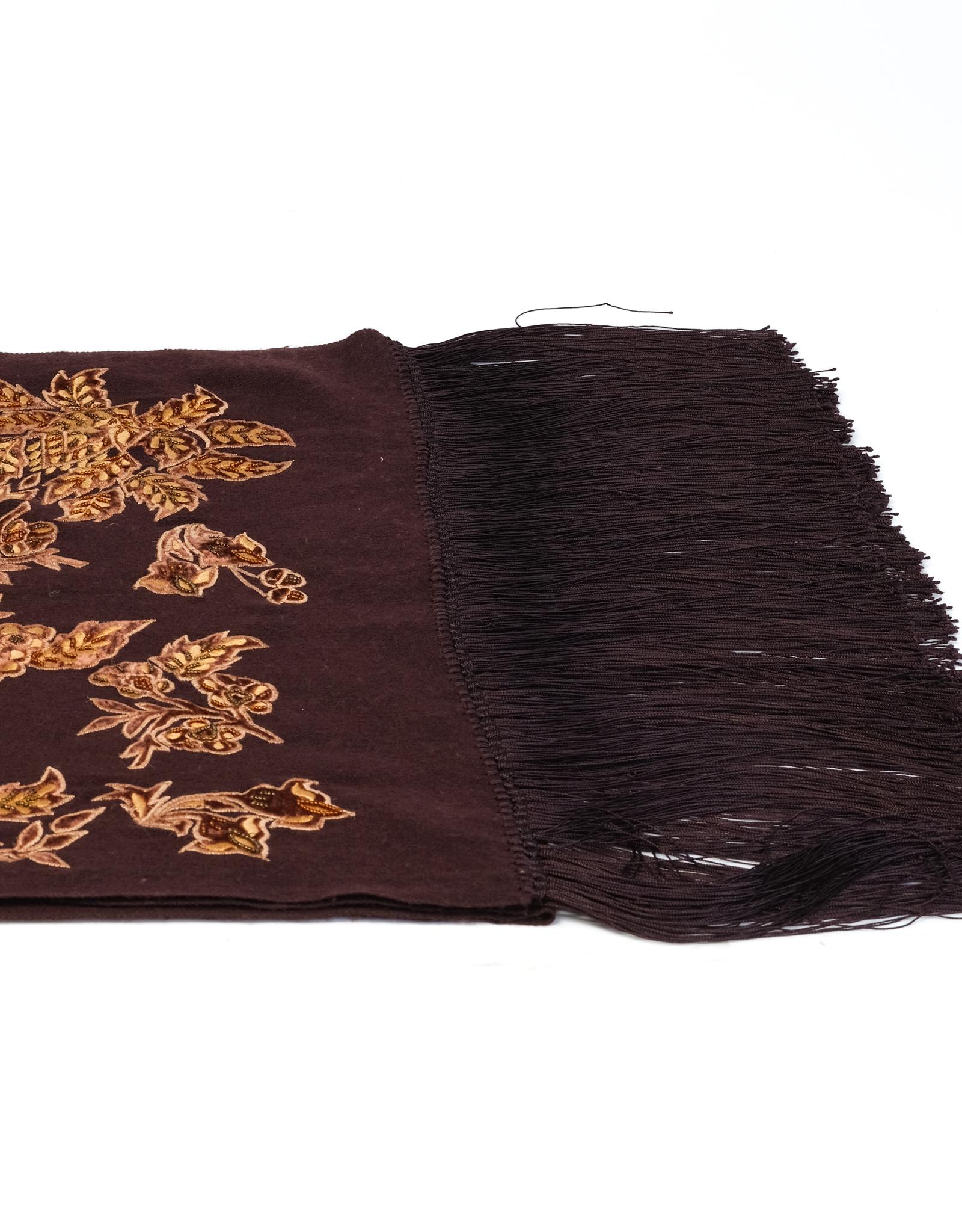 This large Burberry brown and gold stole is made of a cashmere/silk blend and embroidered with blooming flowers. 

COLOR: brown/gold
MATERIAL: 70% cashmere 30% silk
MEASUREMENTS: L 73” x W 21”
CONDITION:	Great condition - stole shows some fuzzing