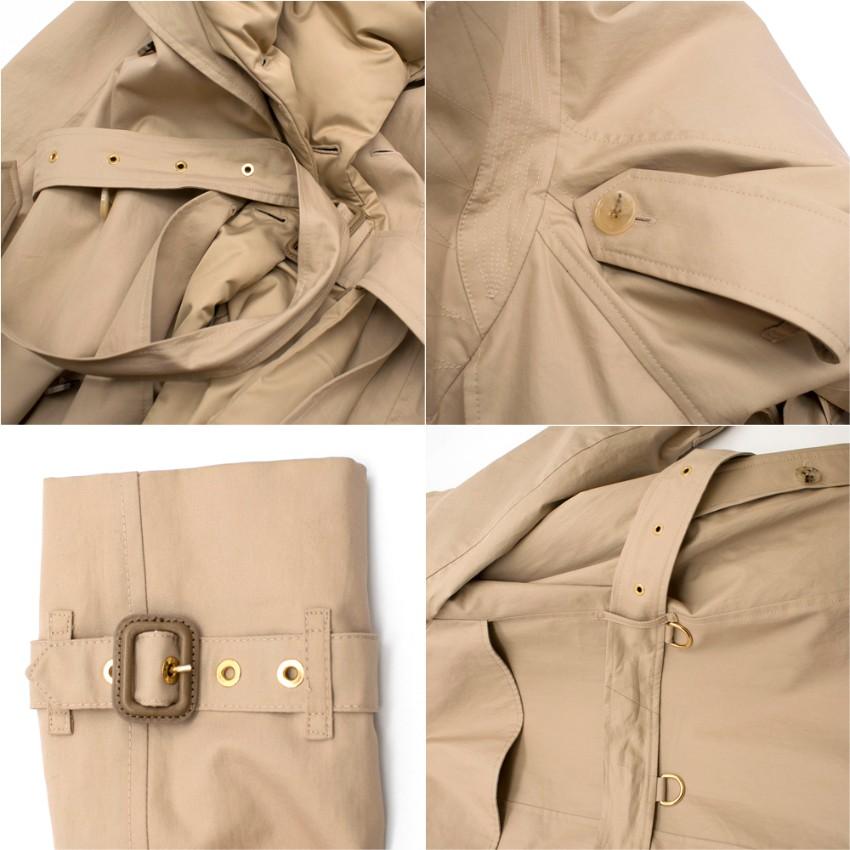 Burberry Detachable Collar Cotton Gabardine Trench Coat in Ecru.

- Classic Kensington-fit trench coat in cotton gabardine
- Detachable goose down and feather-filled collar and bib. 
- Vintage check 

Please note, these items are pre-owned and may