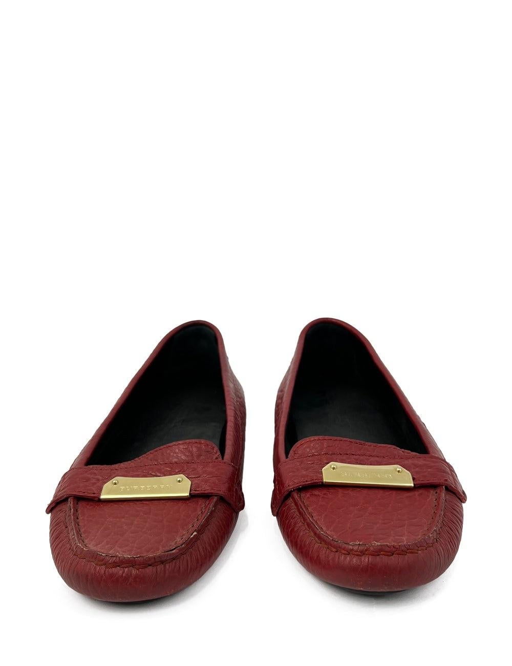 Red leather Burberry Loafers. In excellent condition.

Additional information:
Material: Leather
Size: EU 38
Overall Condition: Very Good
Interior Condition: Signs of wear
Exterior Condition: Light leather scuffing