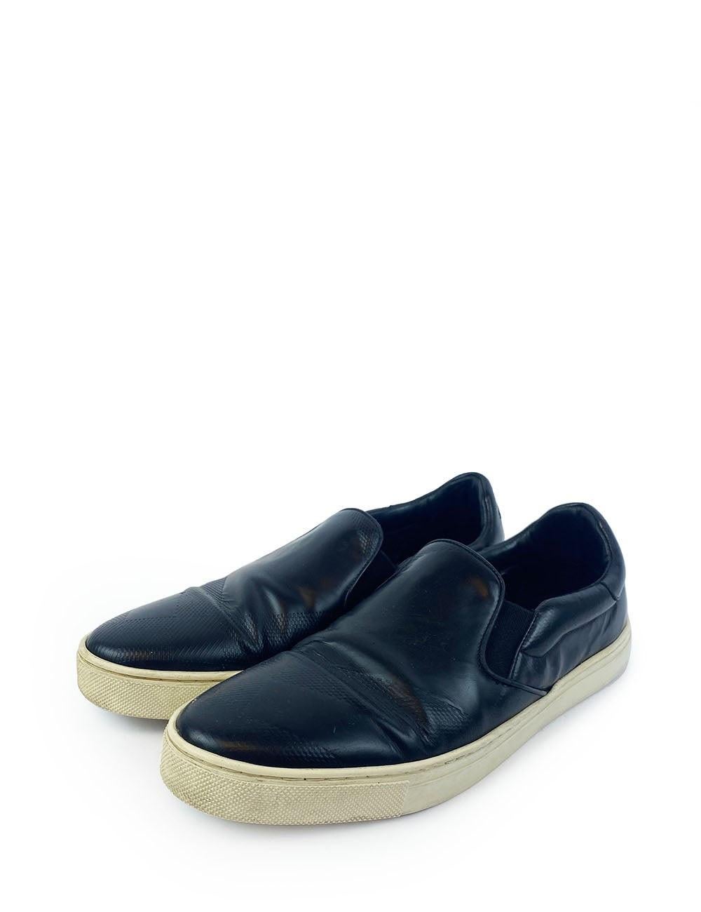 Burberry Black Slip on Leather Loafers with White Soles

Material: Leather
Size: EU 41.5
Condition
Overall Condition: very good
Interior Condition: signs of use
Exterior Condition: leather wrinkling and creasing.
