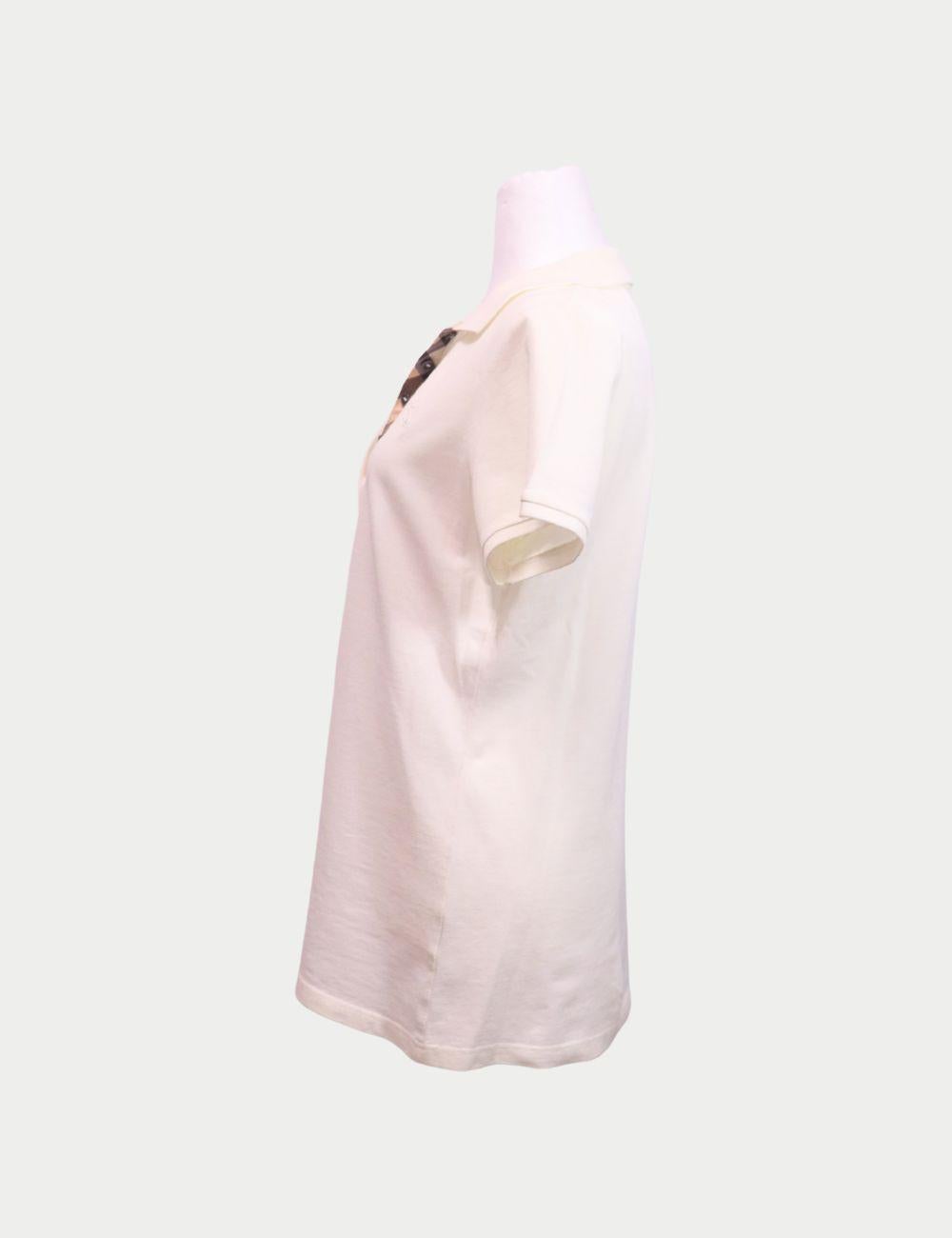 Burberry White Cotton Polo Shirt with Embroidered Logo

Understated luxury meets everyday elegance in this classic white polo shirt by Burberry. Made from soft, breathable cotton, it features a sleek silhouette, tonal embroidered equestrian knight