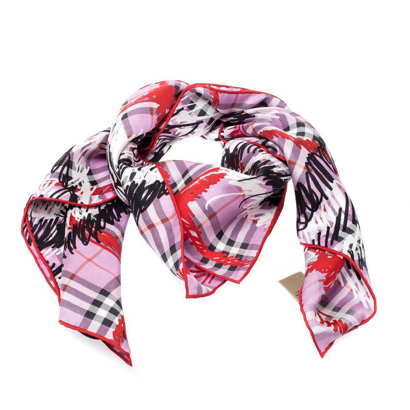 Beautifully cut from silk, this Burberry scarf was made in Italy and it features scribble prints on the signature Check all over and hemmed edges. Make this gorgeous scarf yours today, and flaunt it like a fashionista!

Includes: The Luxury Closet