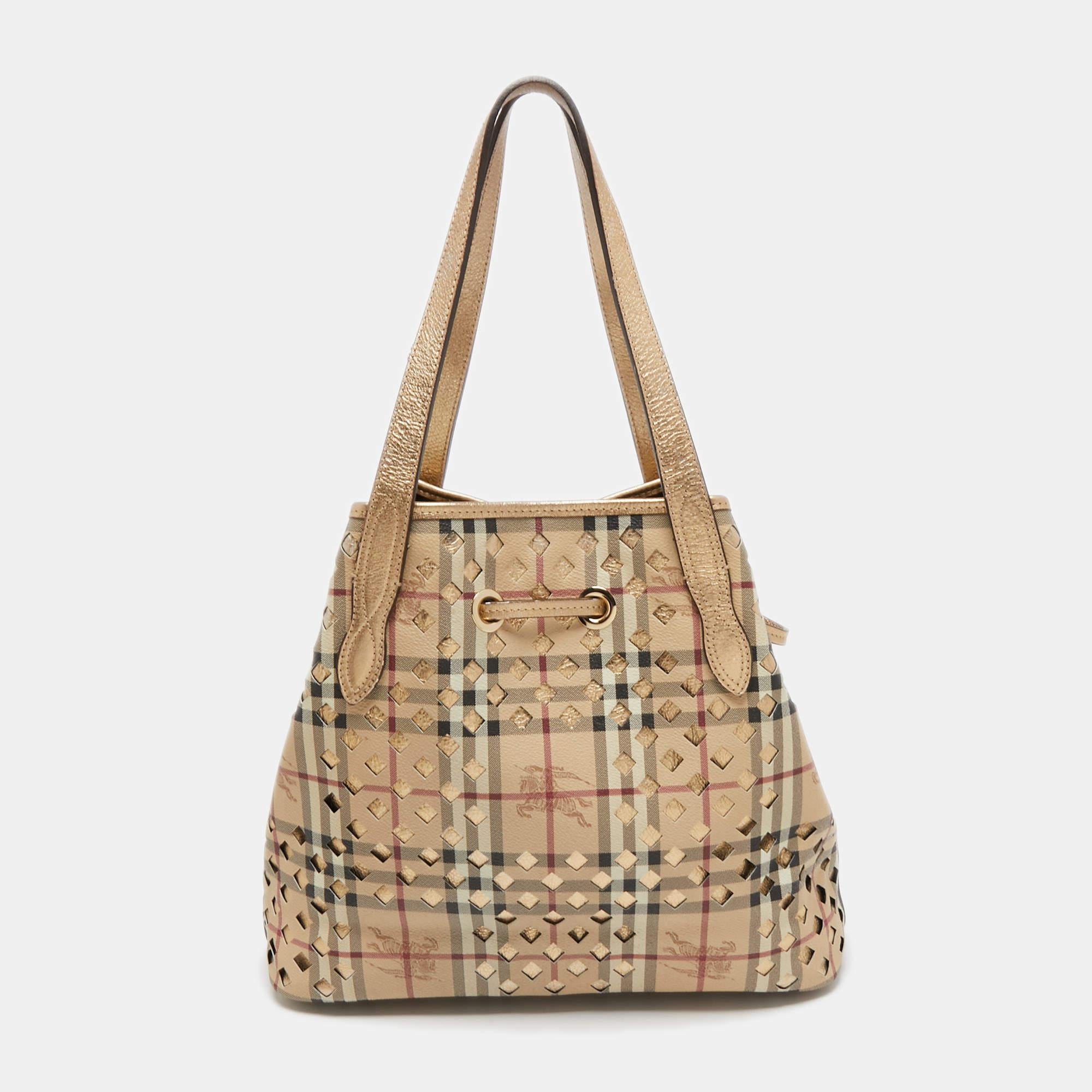 Let this bag accompany you on your next outing. Designed in a classy shade, it flaunts a structural shape and comes made from premium materials. The spacious interior makes it functional, and it can be carried around easily.

Includes: Original