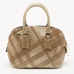 Burberry Borsa bombetta Orchard piccola in pelle goffrata Heritage Check Oro