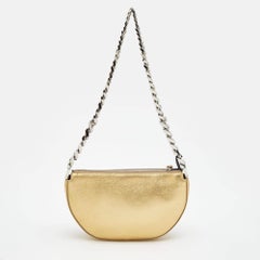 Burberry Borsa mini Olympia con zip e catena in pelle dorata