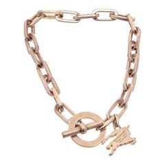 Bracelet à bascule Burberry en or avec quincaillerie de couleur or, 33384MSC