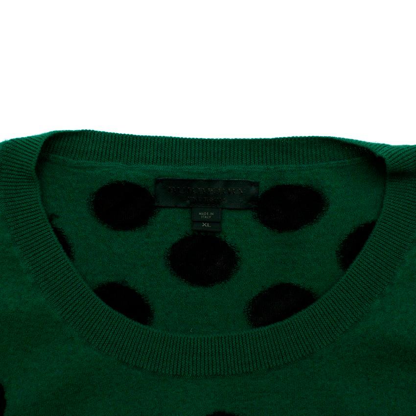 green and black sweater