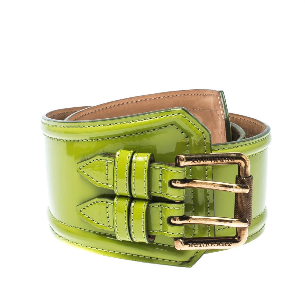 Add more style to your wardrobe with this belt from Burberry. Crafted from green patent leather, this accessory features a double buckle fastening. Cinch it over your flowy dresses for a statement look.

Includes: The Luxury Closet Packaging

