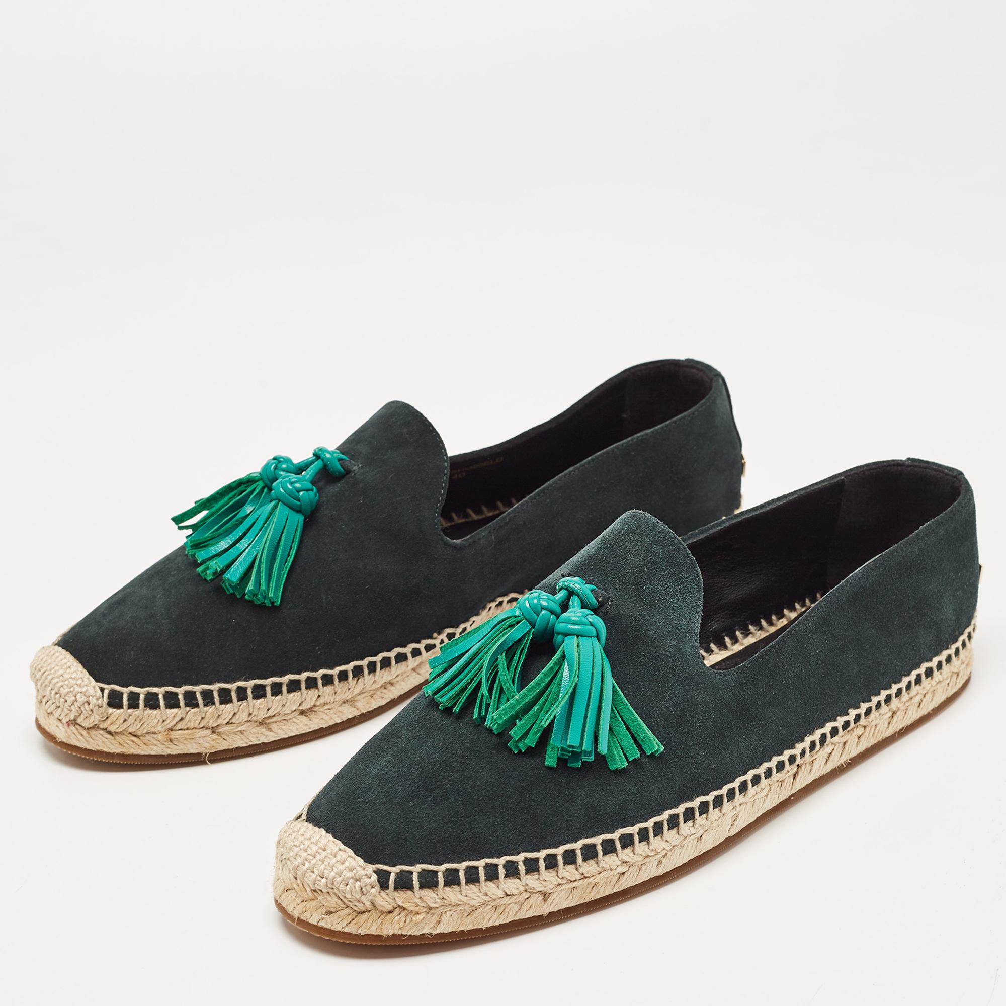 These designer espadrilles exude cool summer vibes while giving all the comfort to your feet. They bring along a well-built silhouette and the house's signature aesthetics. Wear them with anything: jeans, dresses, shorts.

