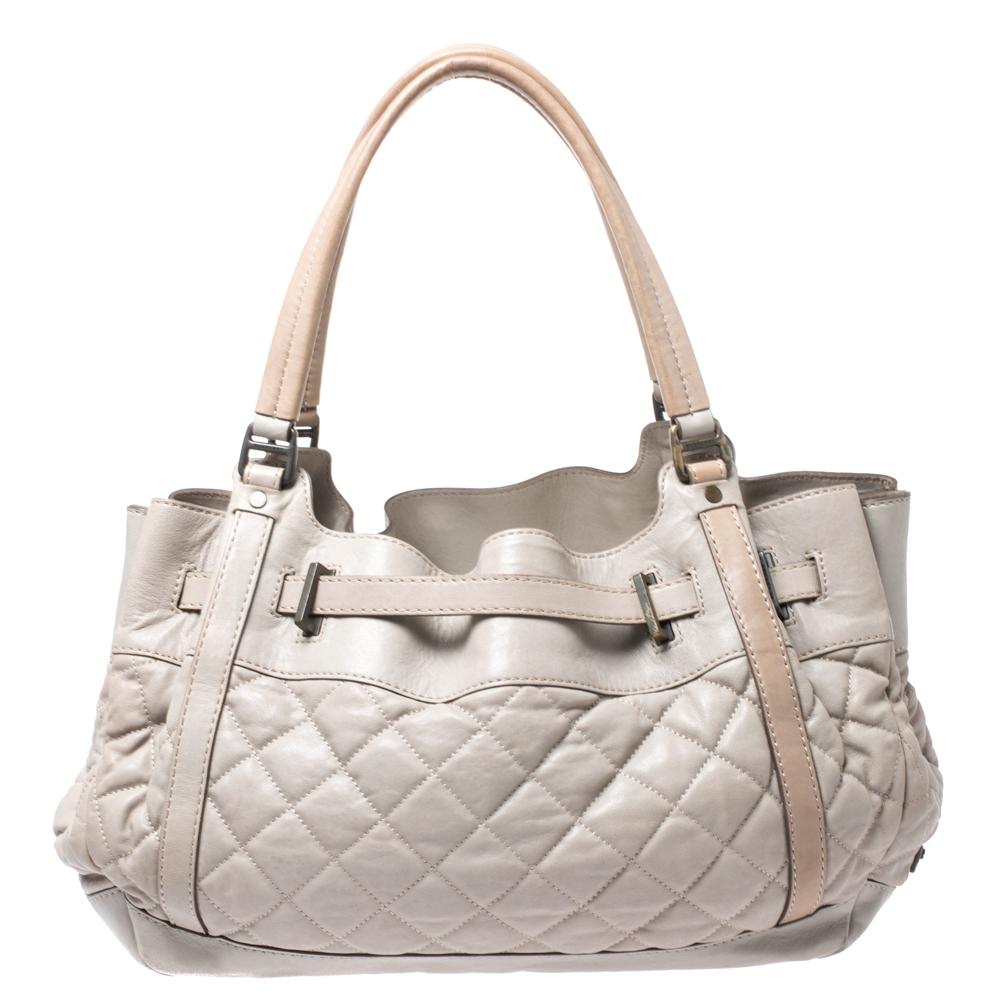 A gorgeous bag meant for stylish women is this hobo. Designed to be spacious enough to carry your everyday essentials, this quilted leather bag from Burberry is a must-buy. It has belt detailing, a fabric interior and a single handle.

Includes: