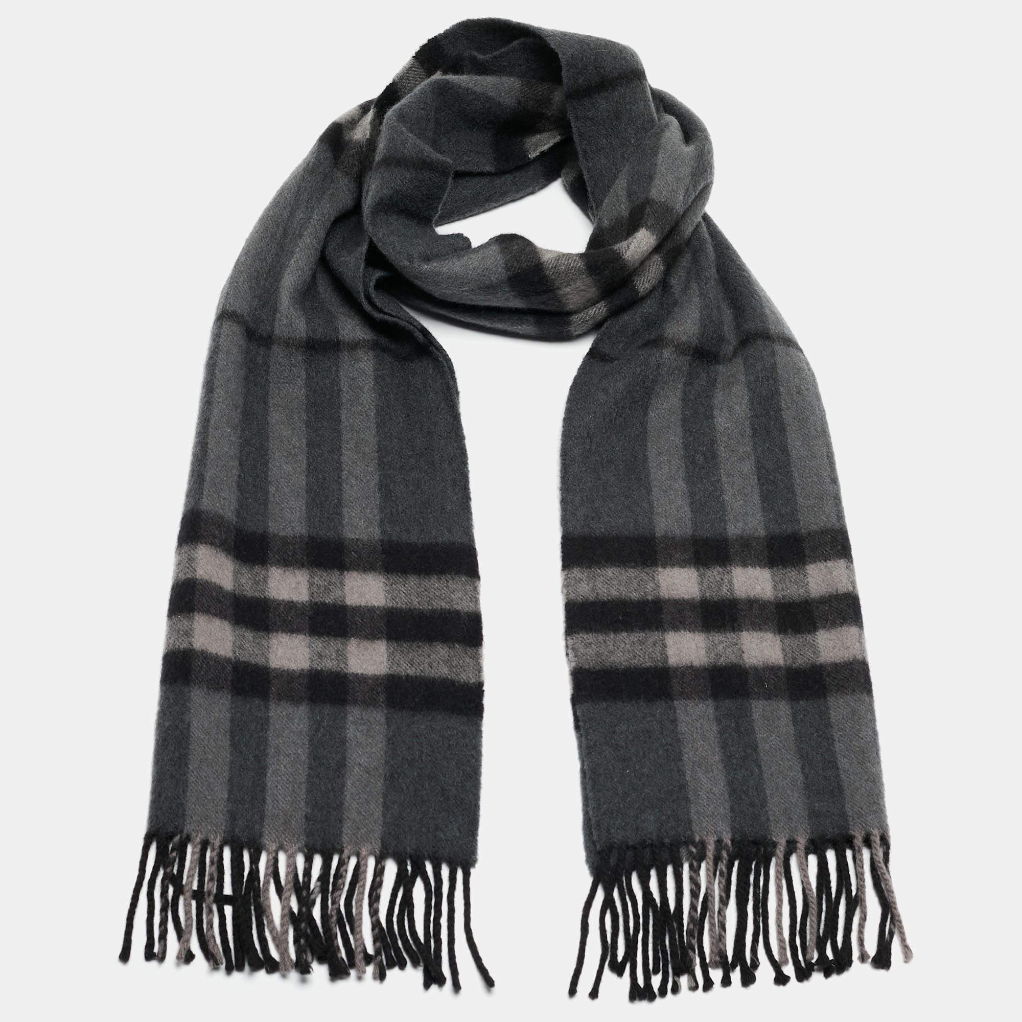 This beautiful scarf is a must-have for any fan of the British luxury fashion house, Burberry. Featuring their iconic Check pattern in breezy shades of grey, it would look absolutely fantastic worn underneath a light winter coat

