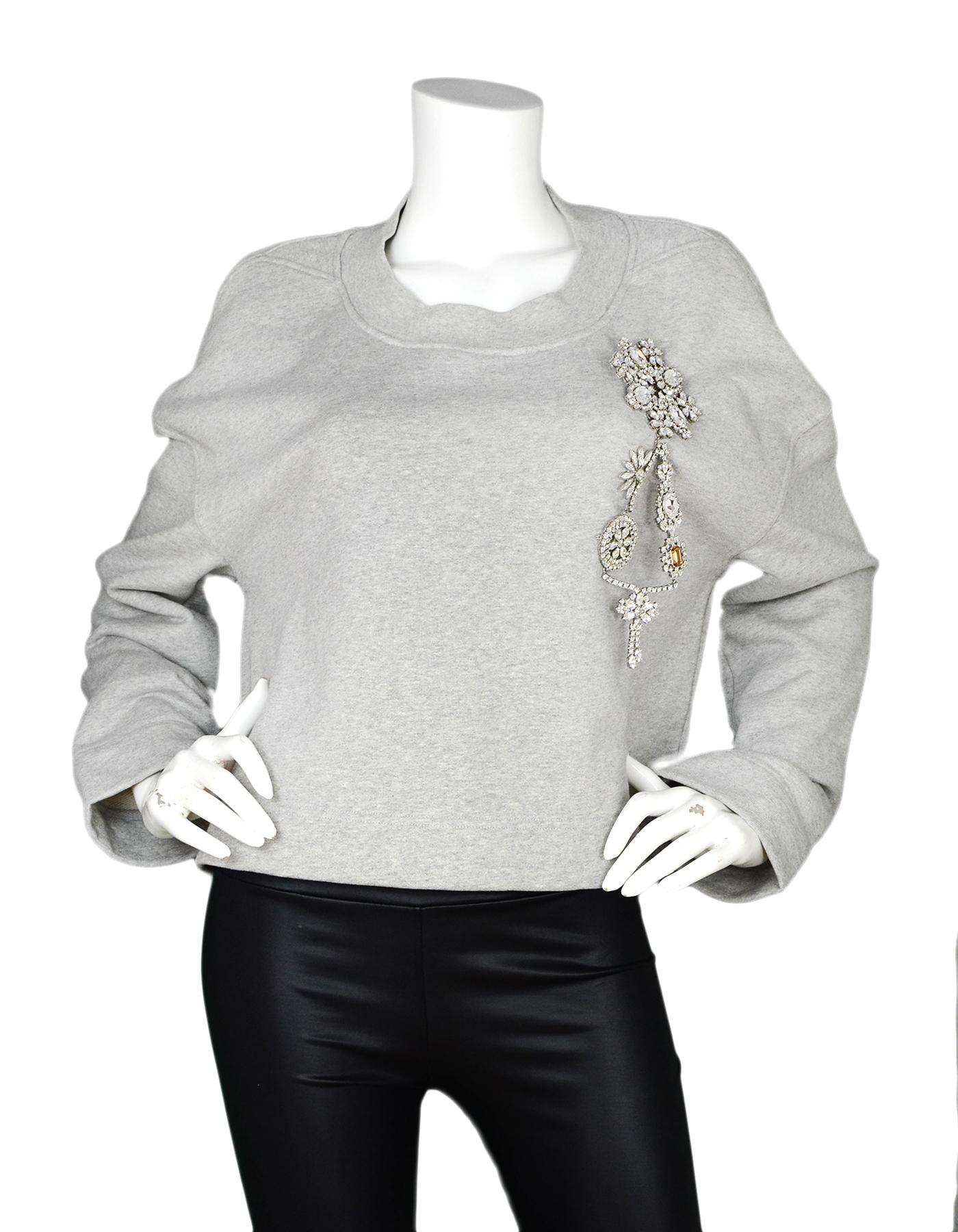 Burberry Grey Cropped Crystal Brooch Sweatshirt Sz S

Made In:  Italy
Color: Grey
Materials: 100% cotton, metal and crystals
Opening/Closure: Pull over
Overall Condition: Excellent pre-owned condition 

Measurements: 
Shoulder To Shoulder: 25
