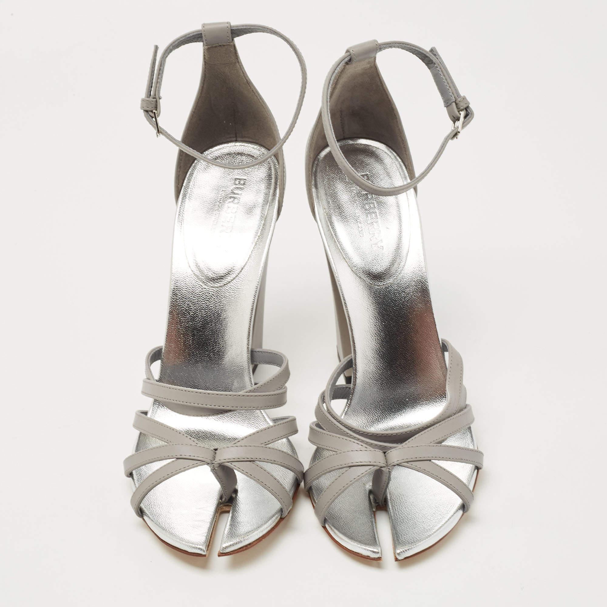 These Burberry grey sandals will frame your feet in an elegant manner. Crafted from quality materials, they flaunt a classy display, comfortable insoles & sleek heels.

Includes: Original Dustbag, Original Box, Tag, Info Booklet

