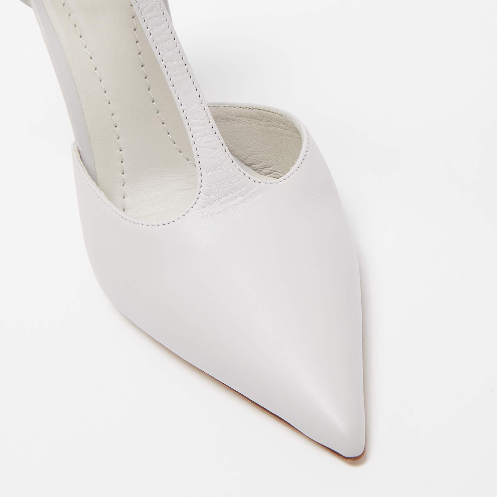 Defined by luxe cuts, unique details, durable construction, and a soft grey hue, this pair by Burberry has all the qualities of a fashionable shoe. Called the Welton, the pump features a leather body, chain ankle trim, leather ankle ties, and carved