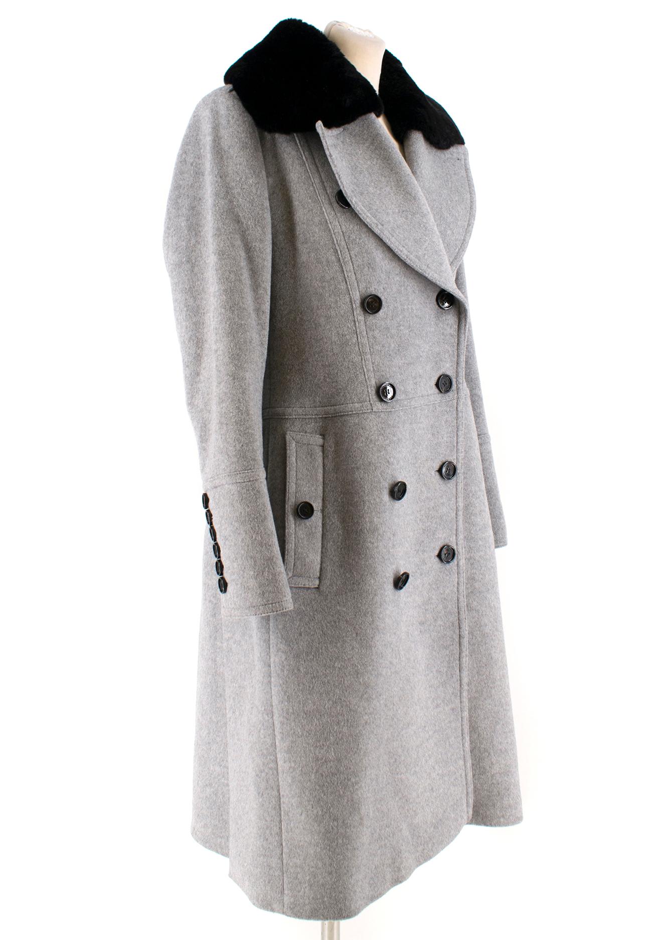 Burberry Grey Wool and Cashmere Coat with Rabbit Fur Collar

-Grey thick coat 
-Detachable black rabbit fur collar
-Double breasted coat with black button closure
-Shoulder pads 
-Two front pockets
-Two side slits 
-Back pleating at the waistband