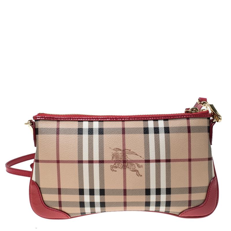 This Haymarket Check coated canvas and patent leather bag is designed to complement your stylish vibe. This Burberry bag will instantly elevate the look of any outfit. It features a long shoulder strap and a well-sized interior.

Includes: Original