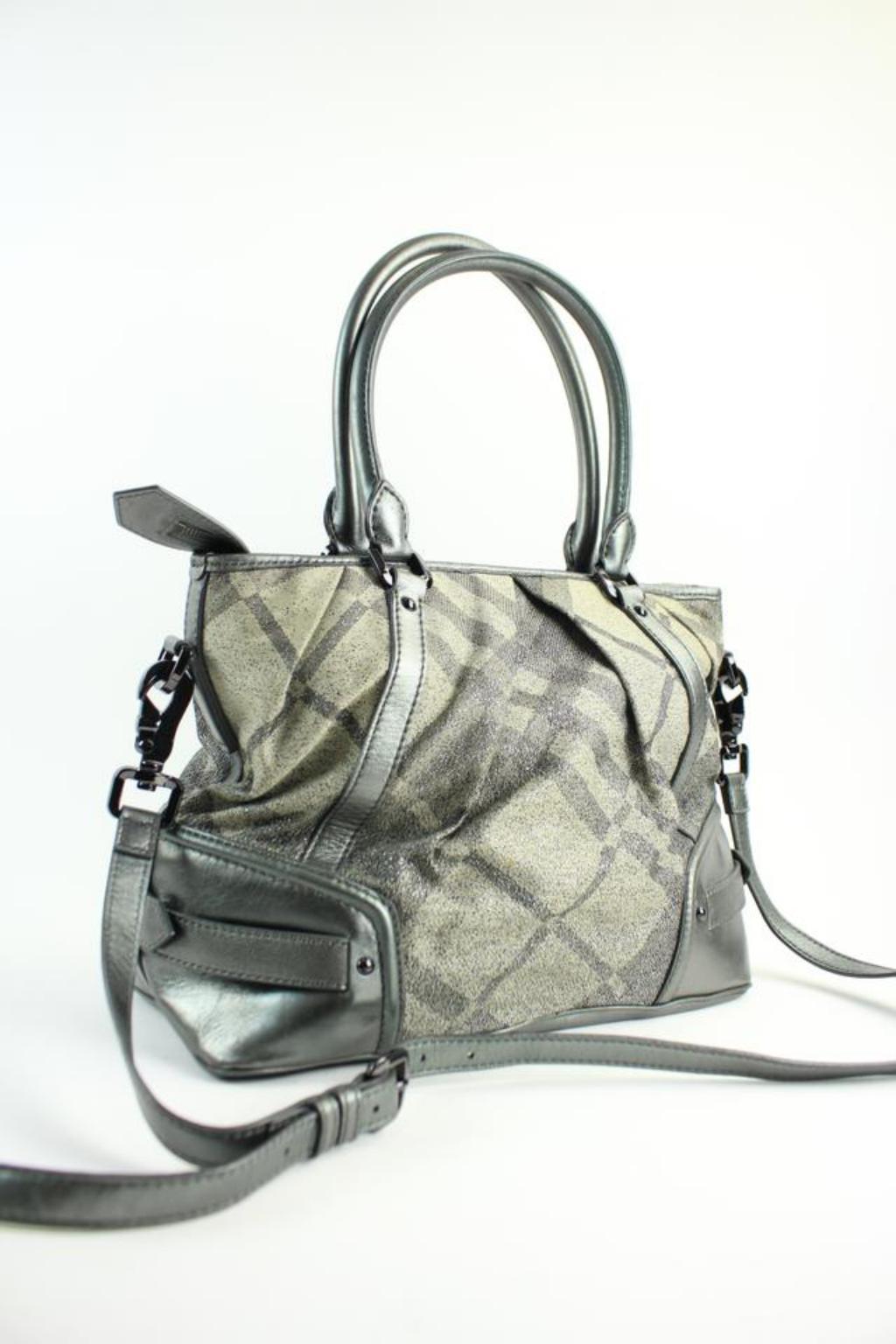 OVERALL VERY GOOD CONDITION 
( 7.5/10 or B+ )
Signs of Wear: Minor marks on the bottom and corners of the bag. Bottom will regain shape with use.
This item will ship immediately!!
Previously owned.
Made In: London
Measurements: Length: 14