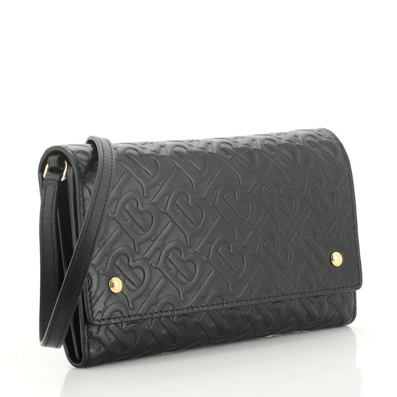 Burberry embossed leather wallet with detachable strap top