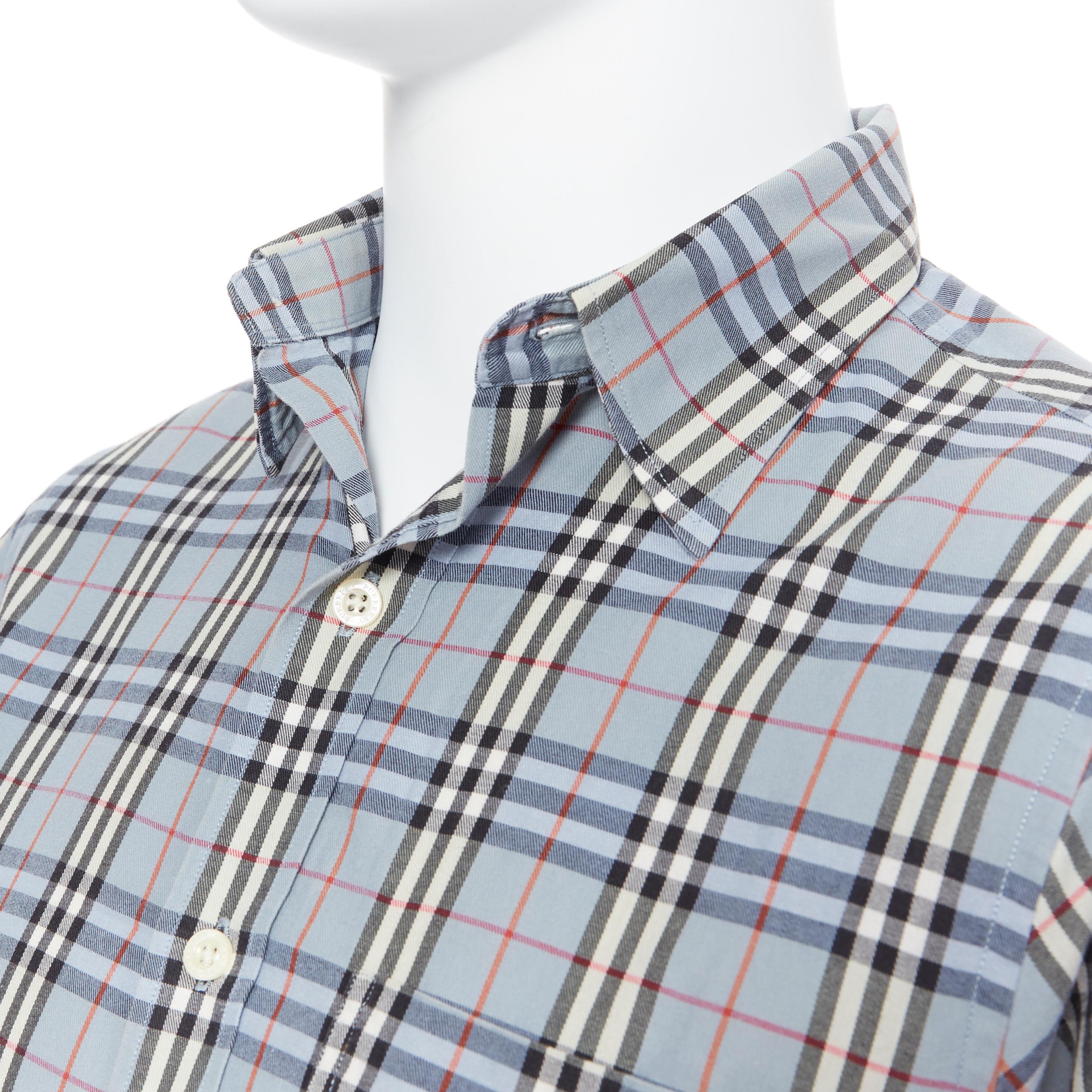 BURBERRY House Check blue checkered cotton short sleeve casual shirt S
Brand: Burberry
Model Name / Style: Cotton shirt
Material: Cotton
Color: Blue
Pattern: Check
Extra Detail: Short sleeve. Collared neckline. Spread collar.

CONDITION: 
Condition: