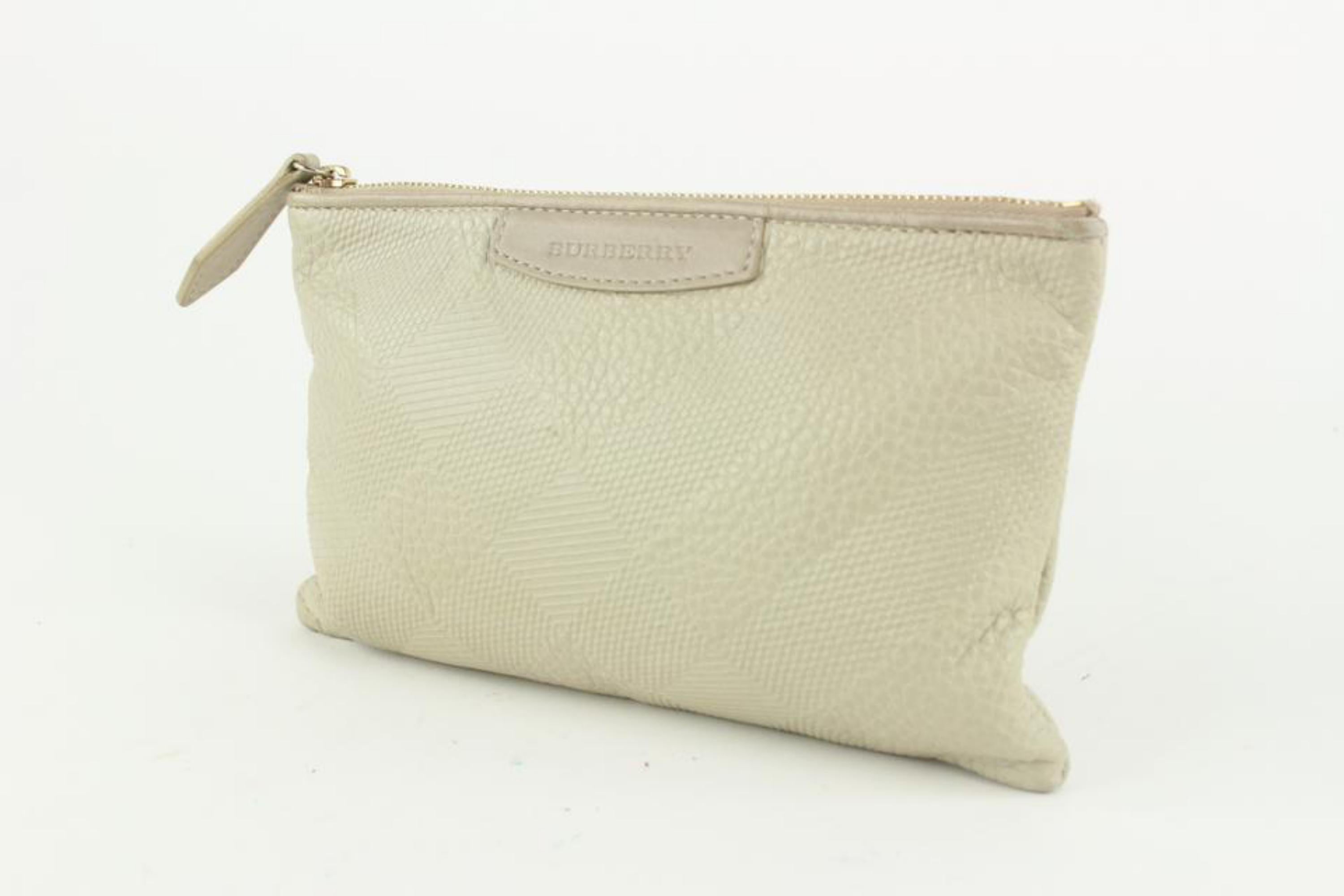 Burberry Ivory Check Embossed Toiletry Cosmetic Pouch 1220b46
Date Code/Serial Number: ITALBSRL239CAL
Made In: Italy
Measurements: Length:  8