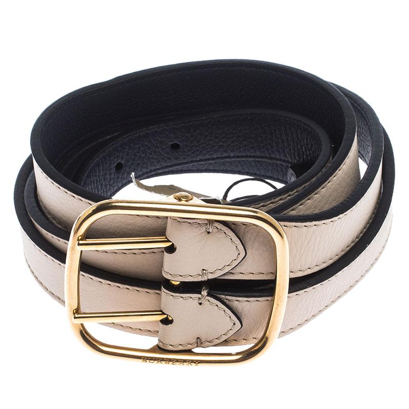 Accessorise right with this lovely belt from Burberry. It is beautifully made from durable leather and designed in a twin style with a double pin buckle. The ivory Lynton belt can be worn to cinch skirts and dresses.

Includes: Original Dustbag,
