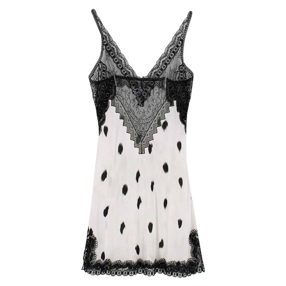 Lace Panel Animal Print Slip Dress

- Lace Trim Neckline and Hemline 
- Thin Shoulder Straps 
- 100% Silk 

Made in Italy 

Measurements are taken with the item lying flat, seam to seam.

Length: 63cm