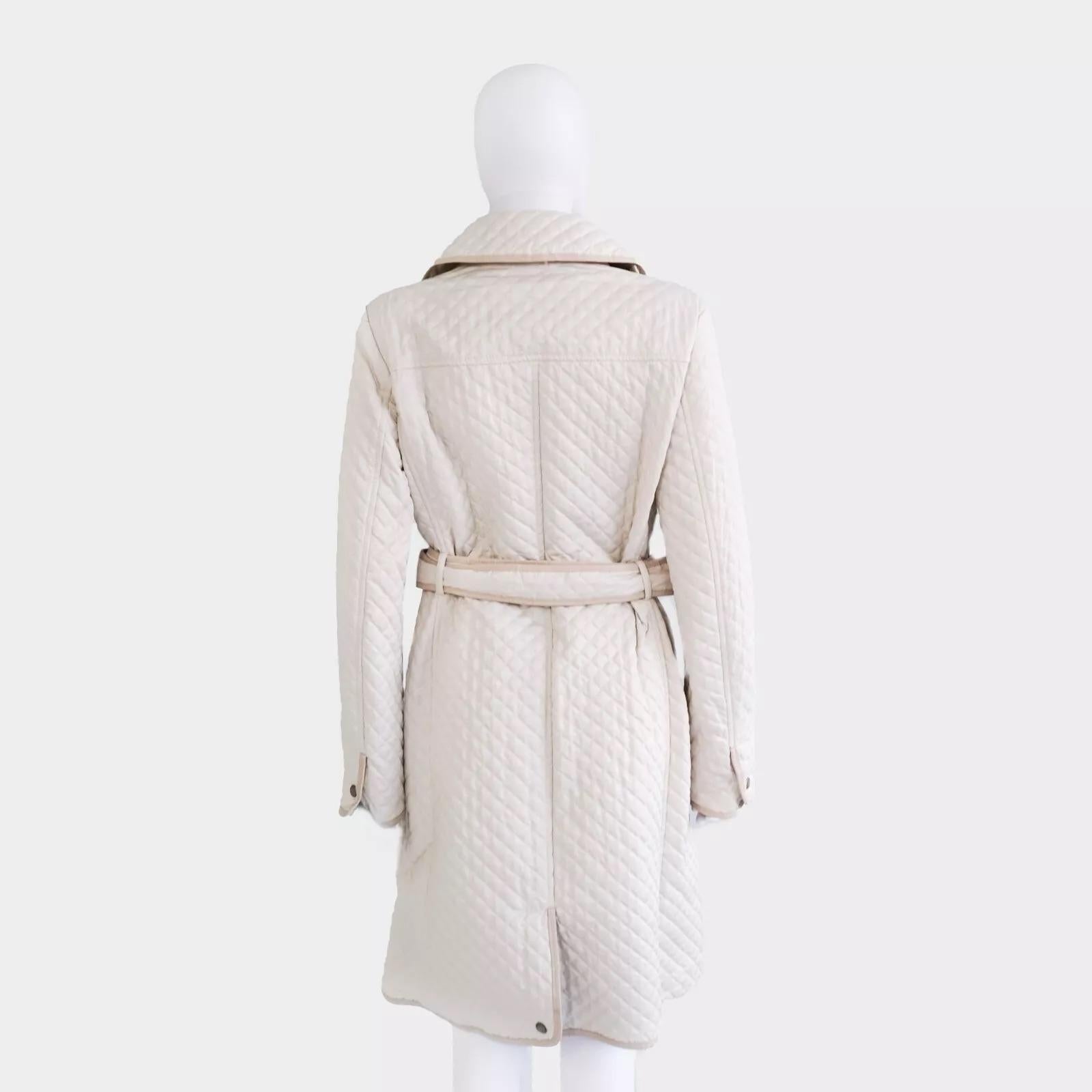 Burberry London Quilted Ivory Jacket Women’s L - Belted with Leather Trim

This preowned Burberry London quilted jacket is in used condition and sold as is. The jacket is ivory or a darker off-white shade with cream beige-colored leather trim.